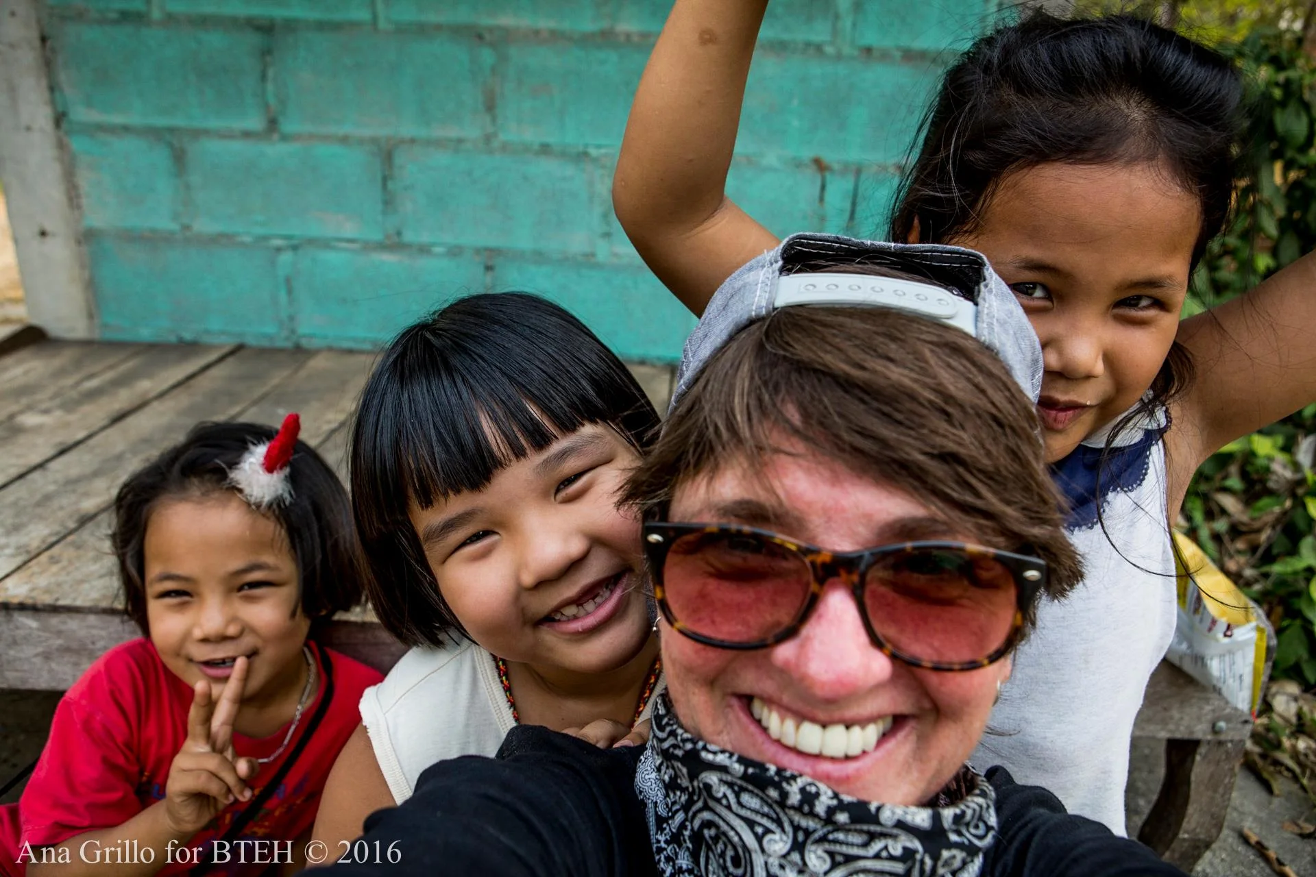 Local junior beekeepers with Ana Blue Grillo. Selfie break in Kanchanaburi, Thailand.