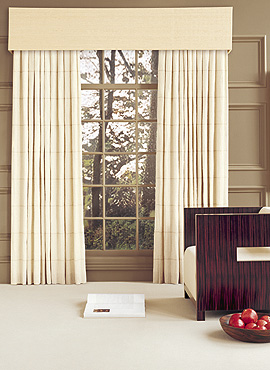 An upholstered cornice box gives these drapes a finished look