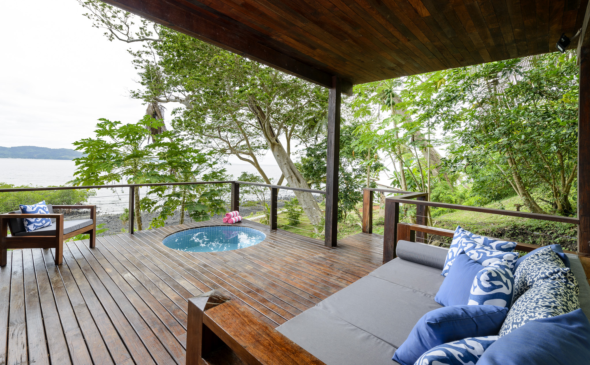 Oceanfront Villa - Outdoor Deck with ocean views and oversized daybed, The Remote Resort Fiji Islands