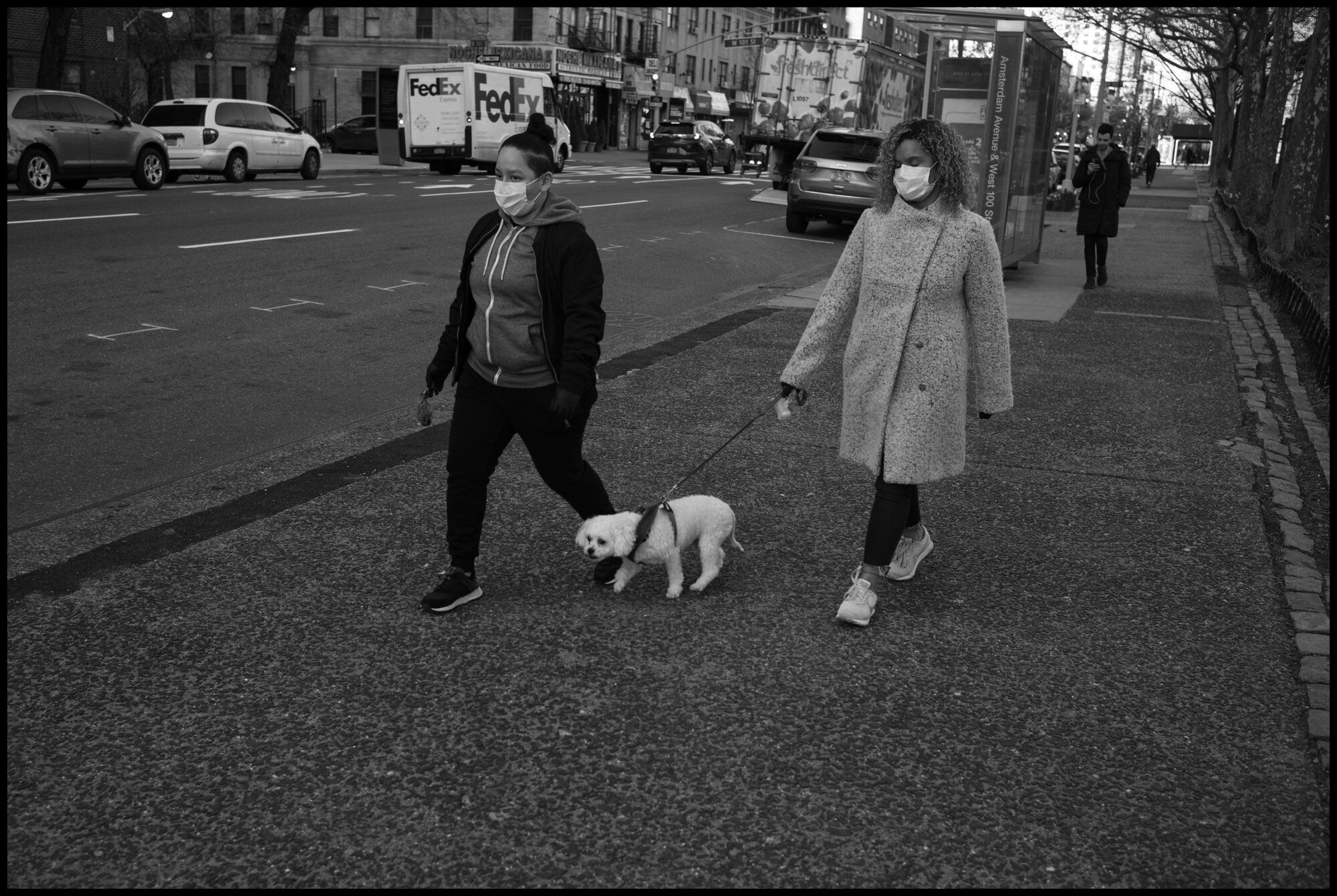  Residents of the Upper Westside take a walk with Max the dog.  March 24, 2020. © Peter Turnley.  ID# 03-012 