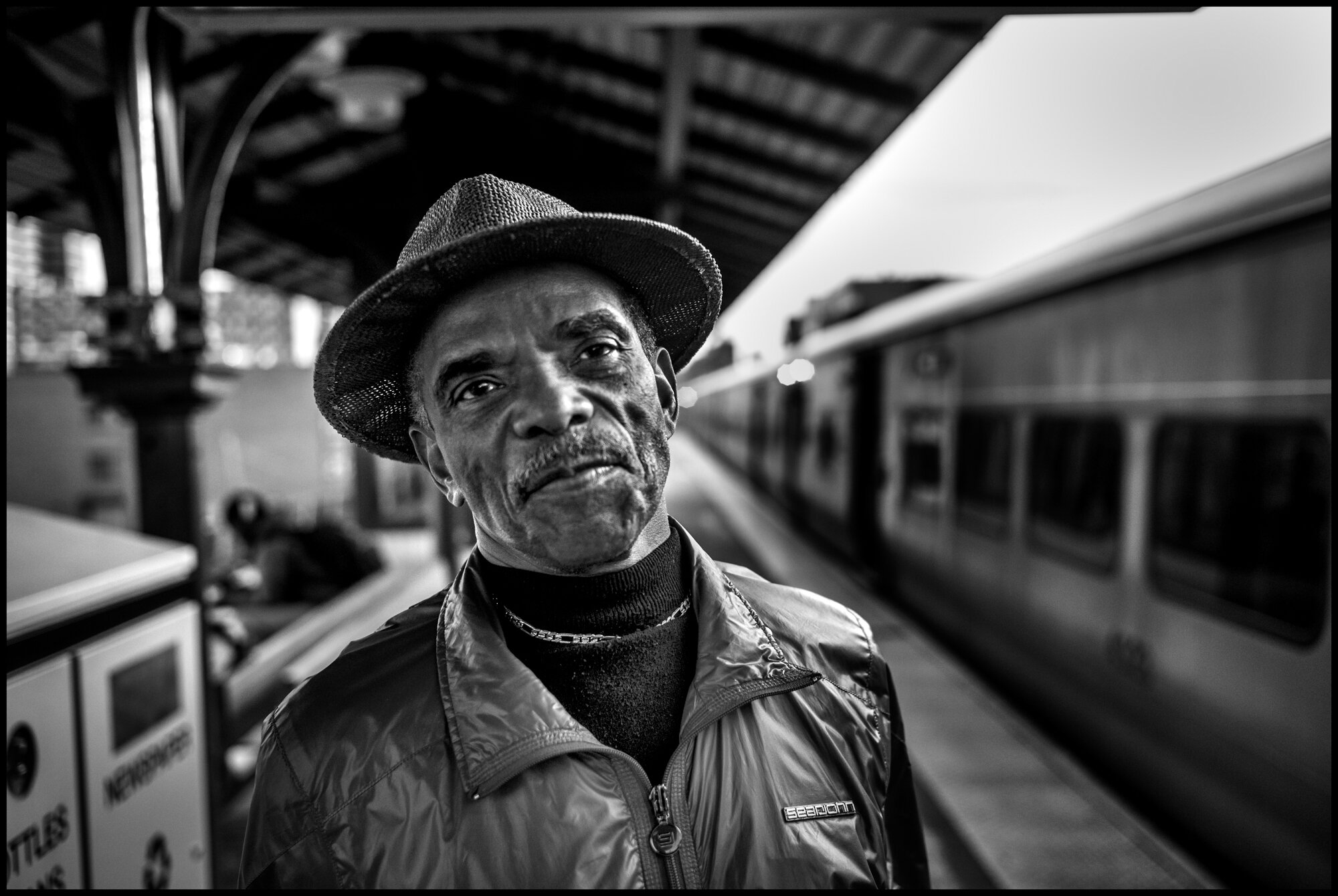  C. Marsh who told me he is a doctor, waits for a train home at the 125thStreet train station in Harlem. I asked him who he felt about the situation, and he said, “please don’t ask me that-it’s been a really long day.”  March 24, 2020. © Peter Turnle