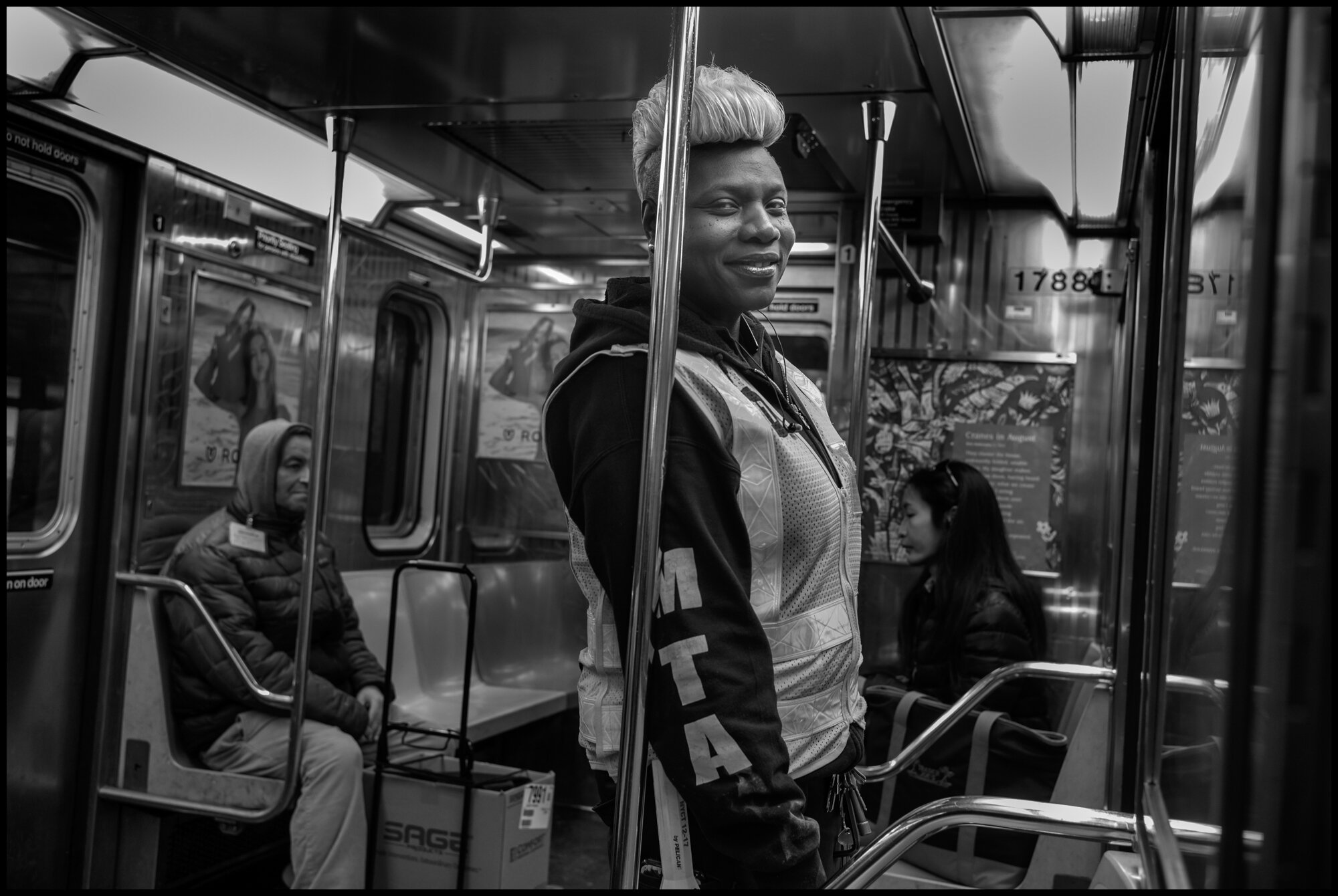  Lesley, 46, works for the MTA. I asked her what her work was today, and she told me that her job is to disinfect the subway stations and she had just come disinfecting the 23rd Street stop.  March 26, 2020 ©Peter Turnley  ID# 04-015 