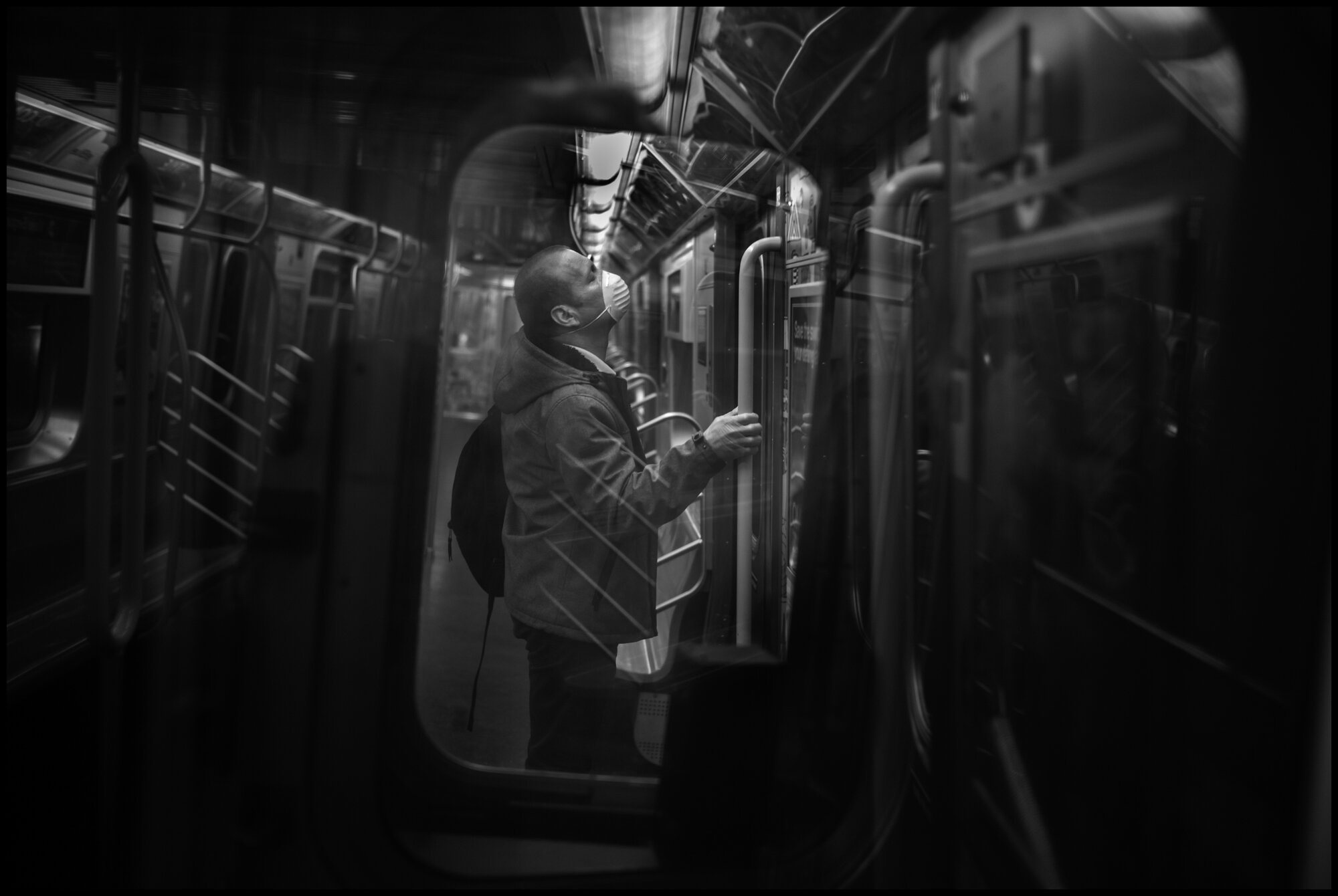 A train heading from Queens towards Manhattan.  March 29, 2020. © Peter Turnley  ID# 07-018 