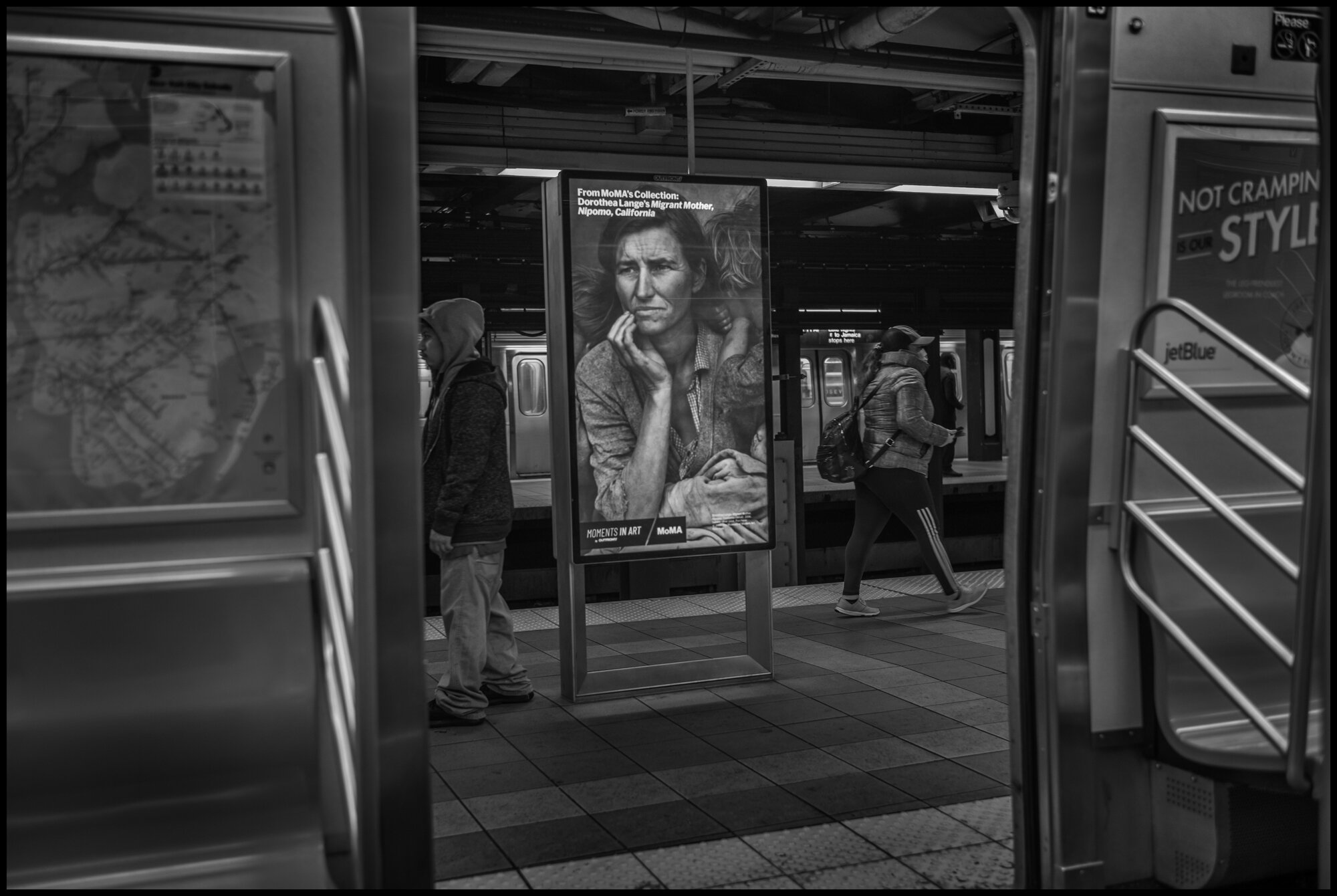  As the train raced towards Manhattan, at one stop, the doors opened and there was a billboard of the famous photograph by Dorothea Lange, “The Migrant Mother”. Dorothea may have been the greatest documentary photographer in history, and seeing this 