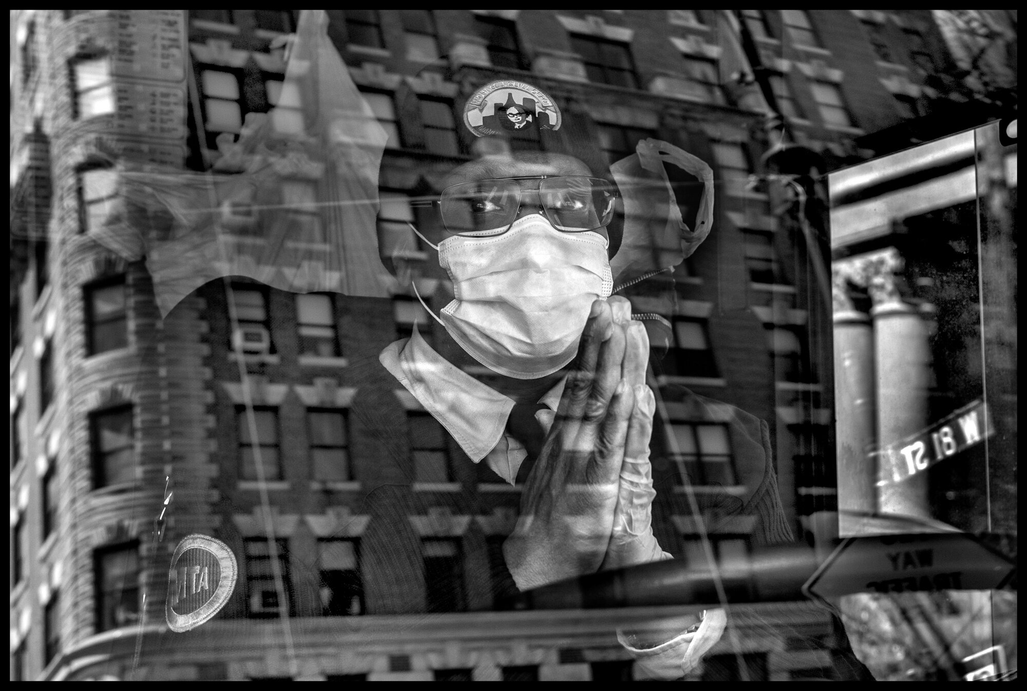  Bus driver on the corner of 81st and Columbus.   April 4, 2020. © Peter Turnley  ID# 12-001 