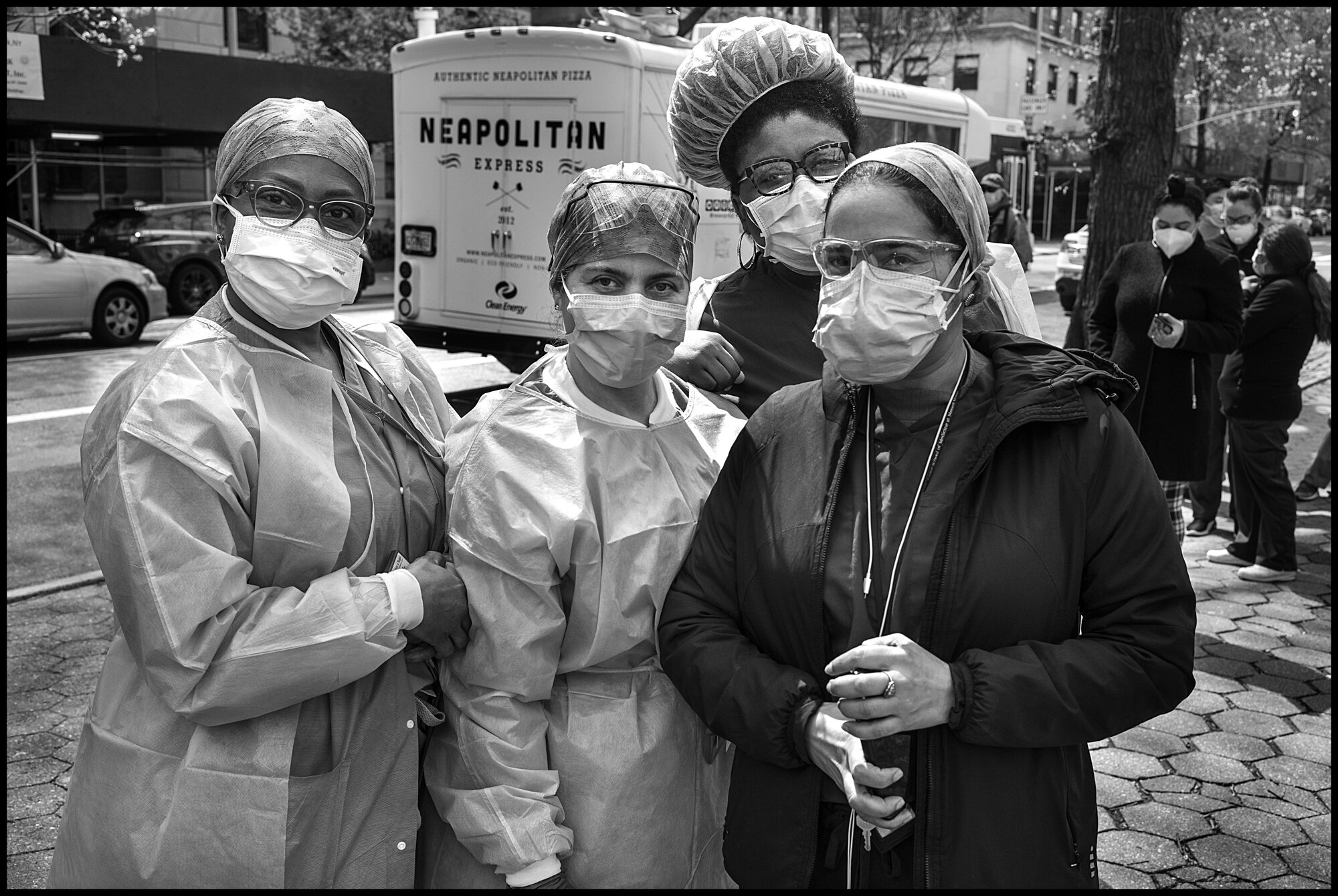  Antonia, Alicia, Arelis, and Jellene are nurses, all involved in treating coronavirus patients at Mount Sinai Hospital in New York.   April 17, 2020. © Peter Turnley  ID# 23-012 