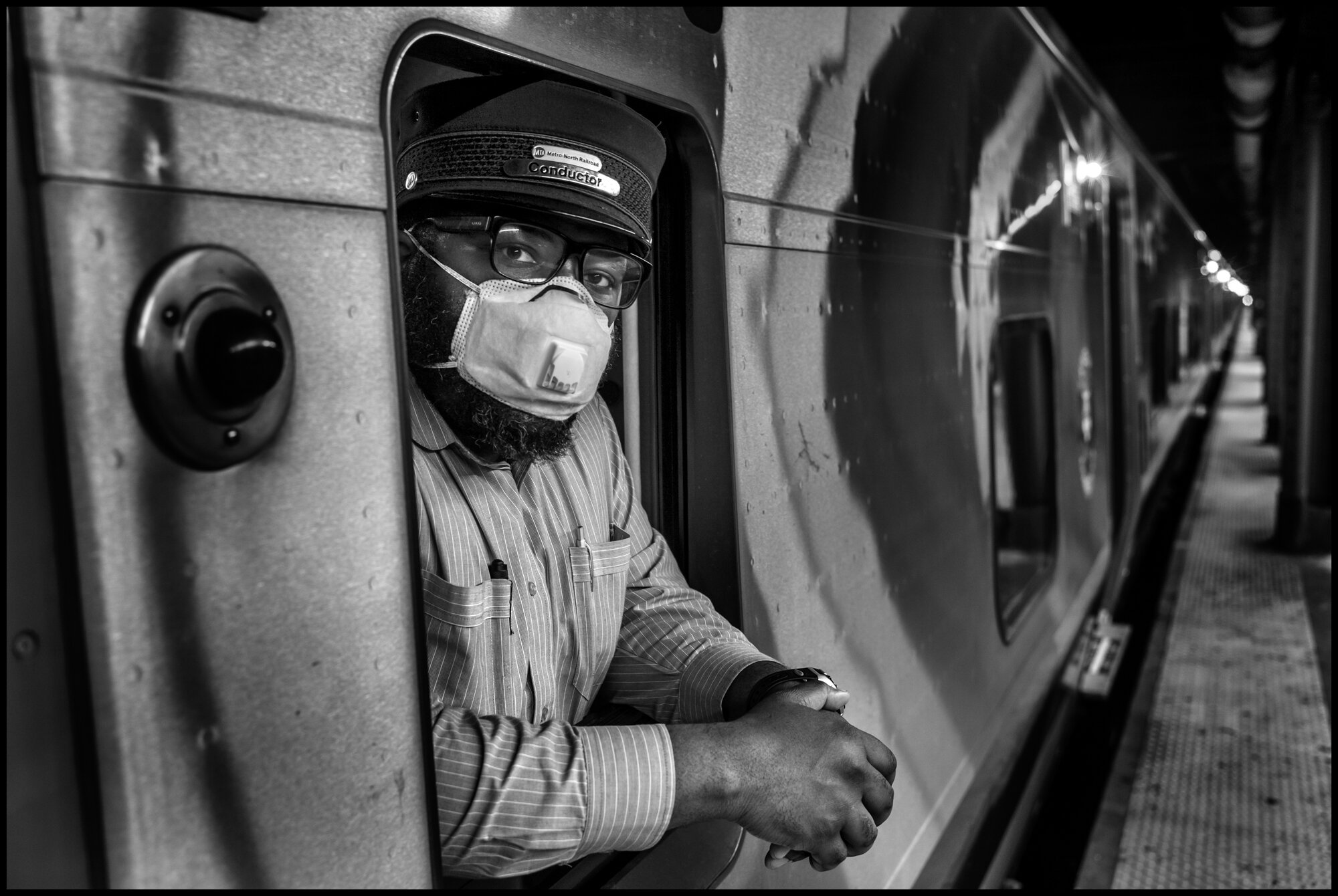  Alex, a train conductor who works for Metro North.   April 18, 2020. © Peter Turnley  ID# 25-007 