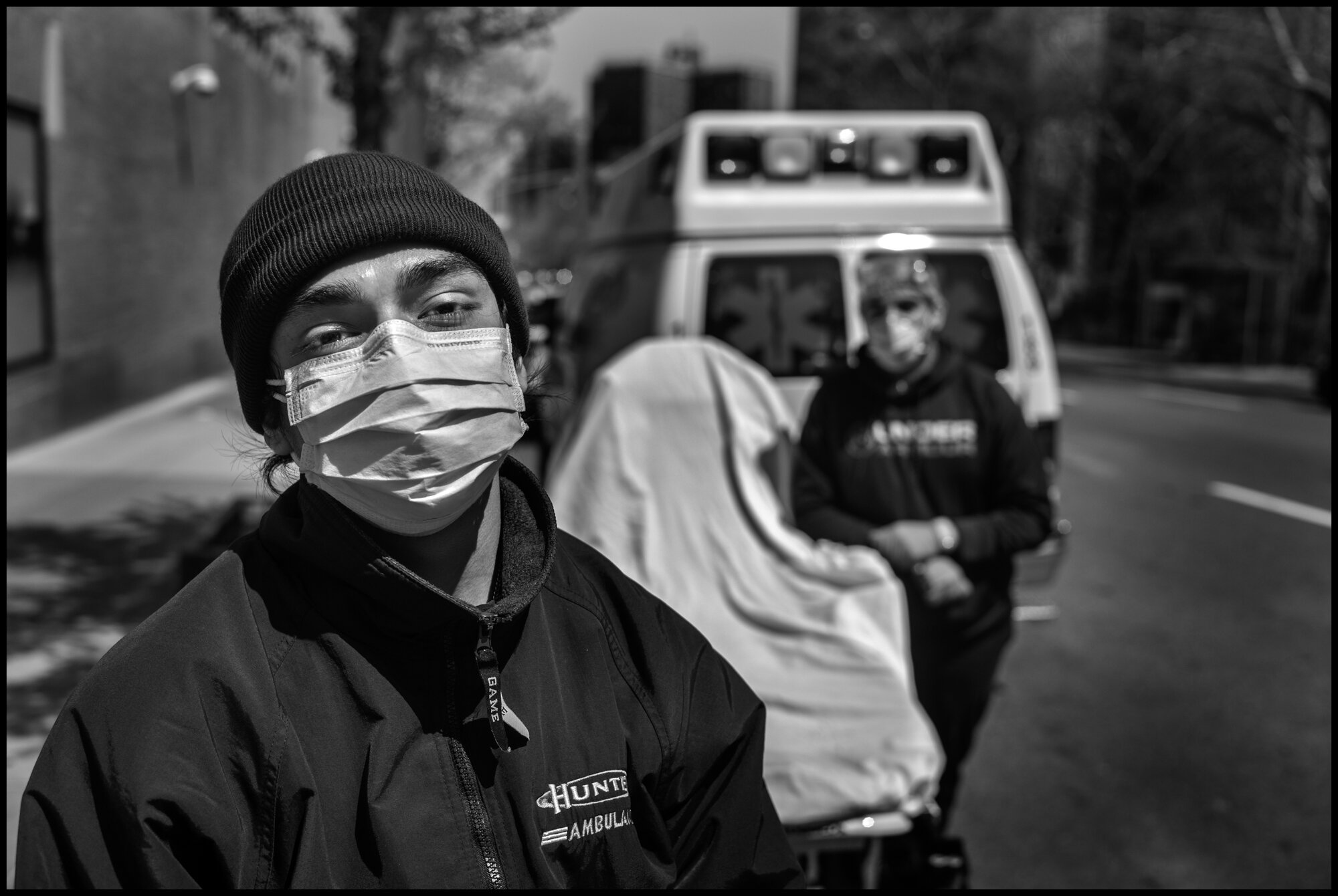  Angel, 21, and Avic 24 are EMT’s. “I treat every patient as if they have Covid you have to go back home, and you are worried. You can’t stop work -you’ve got bills to pay -and a sense of duty.”  April 19, 2020. © Peter Turnley  ID# 26-014 