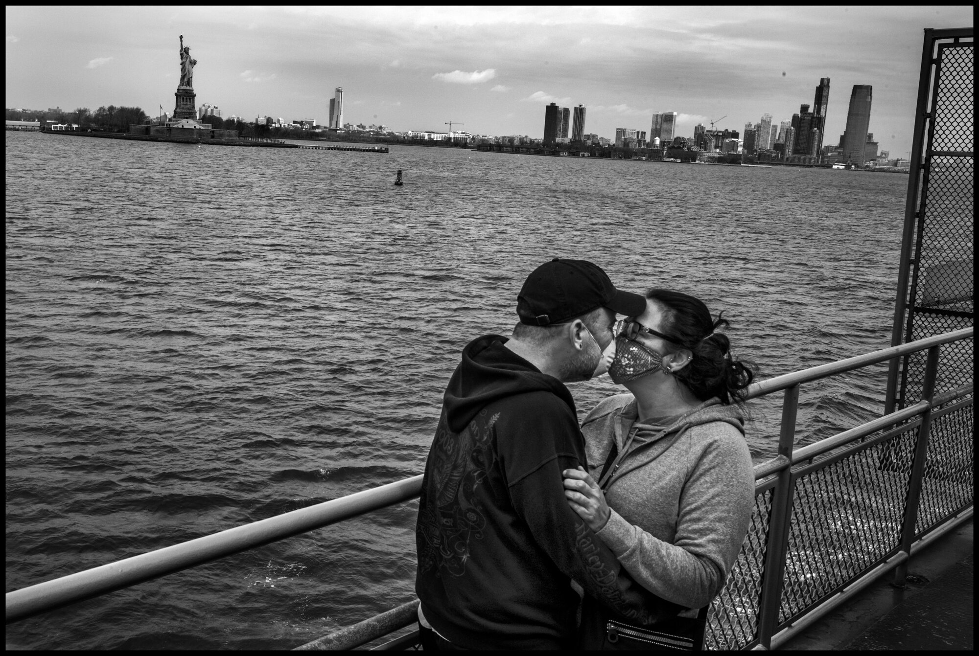  Rachelle and Rob on a ferry to Staten Island.They are both from Parkersburg, W. Virginia, and Rachelle is a traveling nurse who has quit her job as a nurse in a small town in Ohio, to come work with coronavirus patients in an ER in a hospital in Que