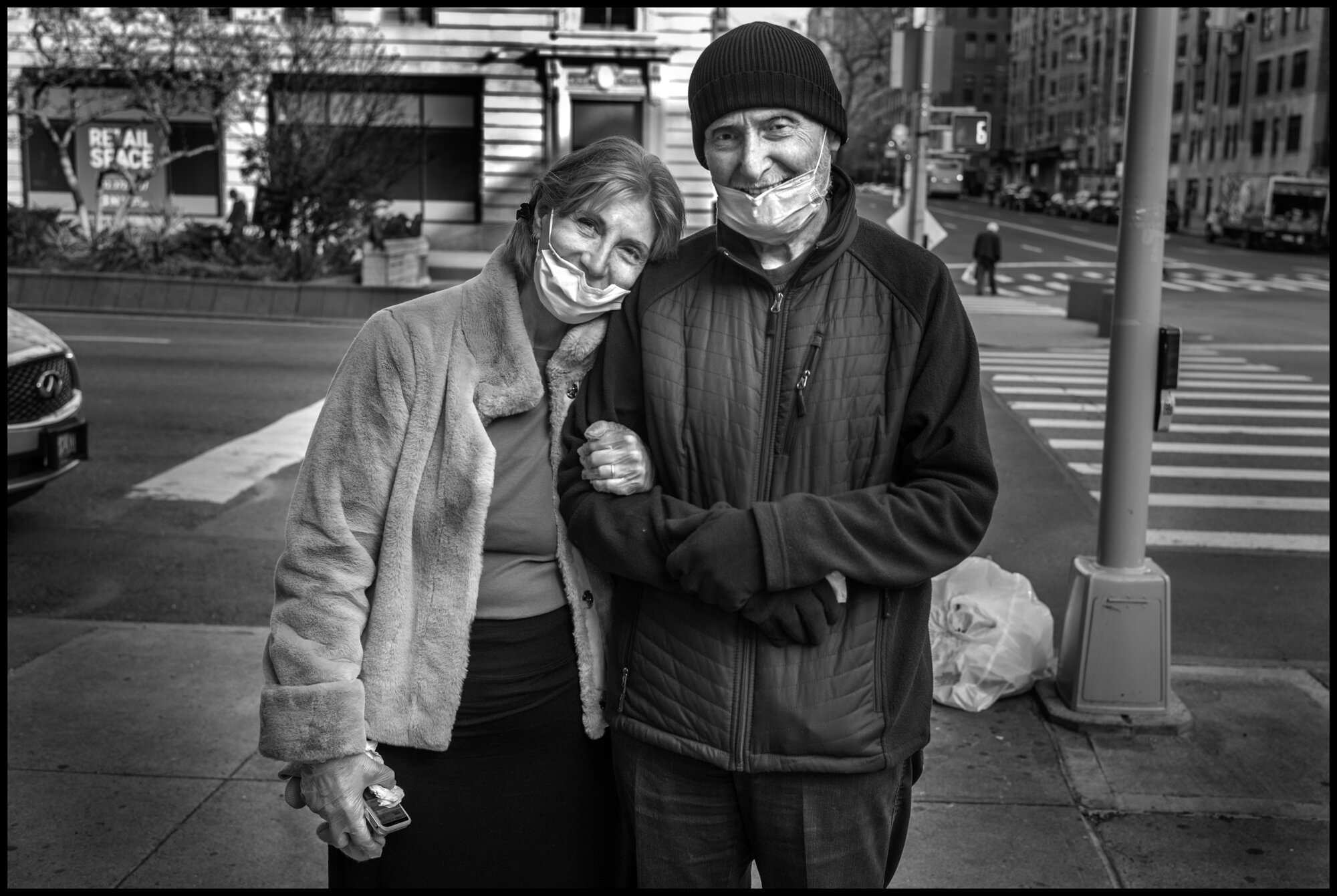  As I crossed a street corner, near Broadway and 85th street, I saw a couple walking both hand in hand. There was something about the way they walked together that felt very happy, and while they were both wearing masks-there was a lift to their step