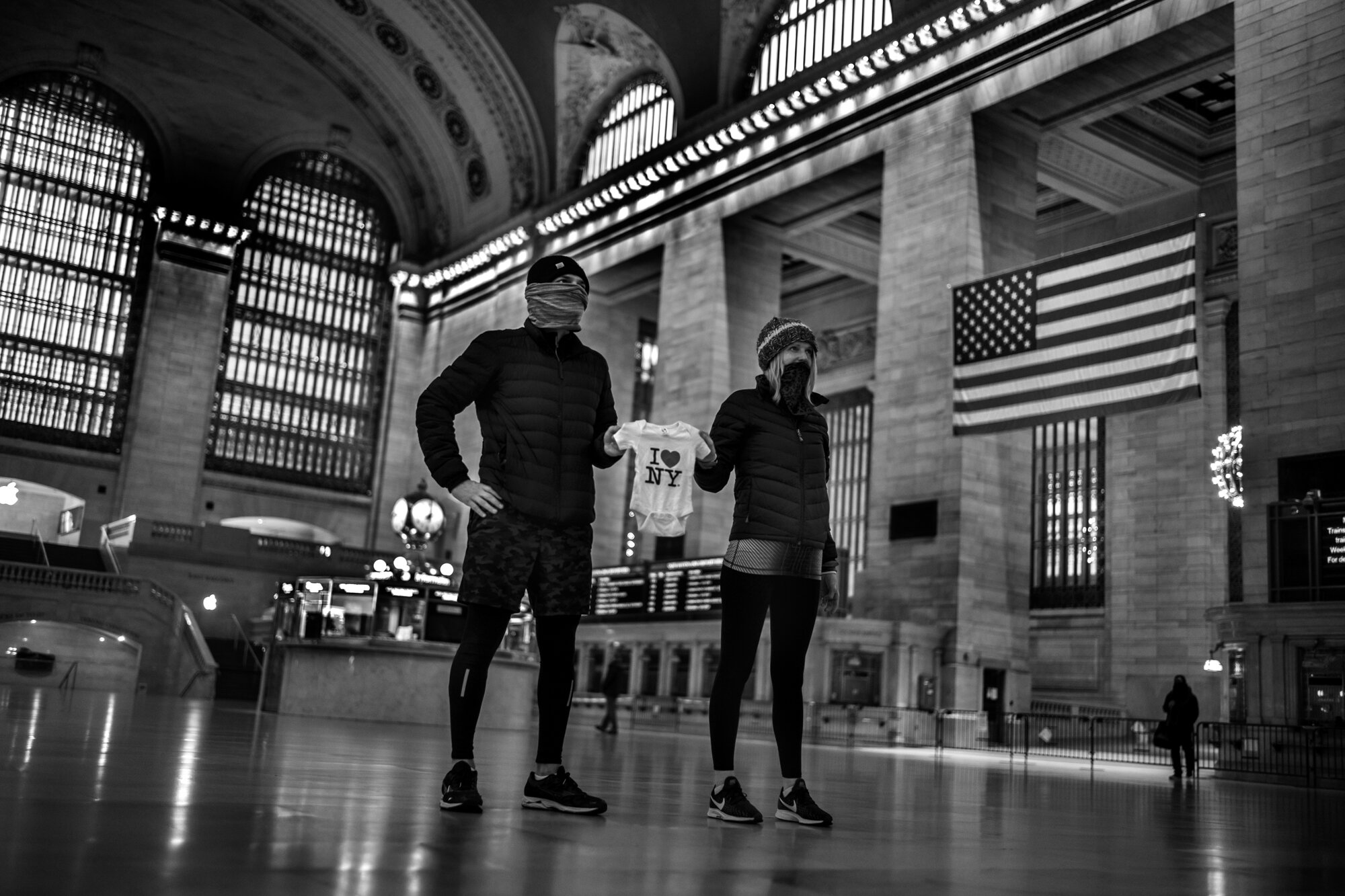  A young couple, John and Megan, stood in the main hall getting their photograph made, holding a “I Love New York” tee-shirt. I asked them why they had come to do this. They explained that they were expecting a baby in September and they wanted to ha