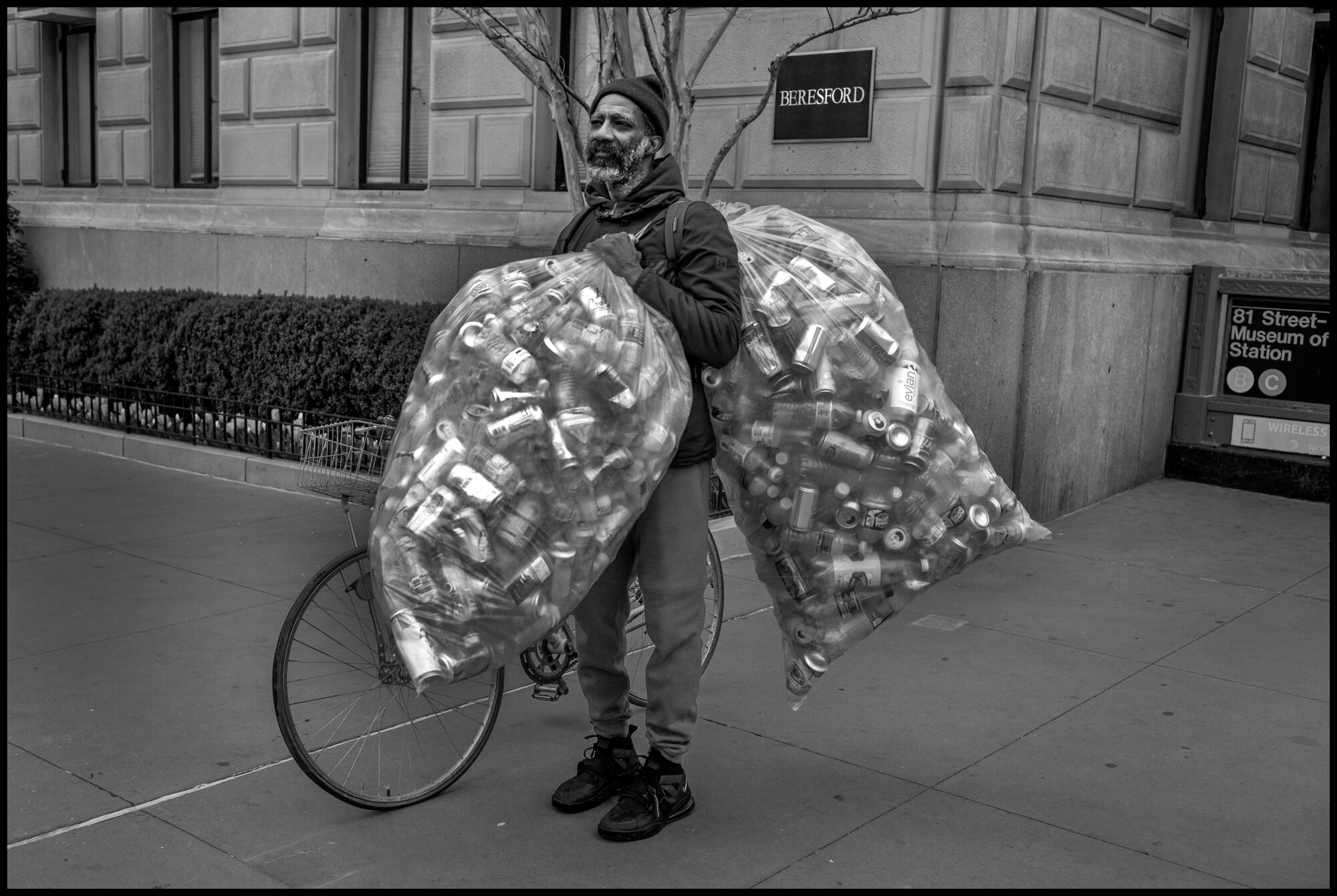  Al, 53. collects cans on 86 street for money for food for himself and his dog, LaBela. He has to take them all the way back to Brooklyn where he lives to collect the money, because everything is closed where he usually goes on the Upper Westside. He