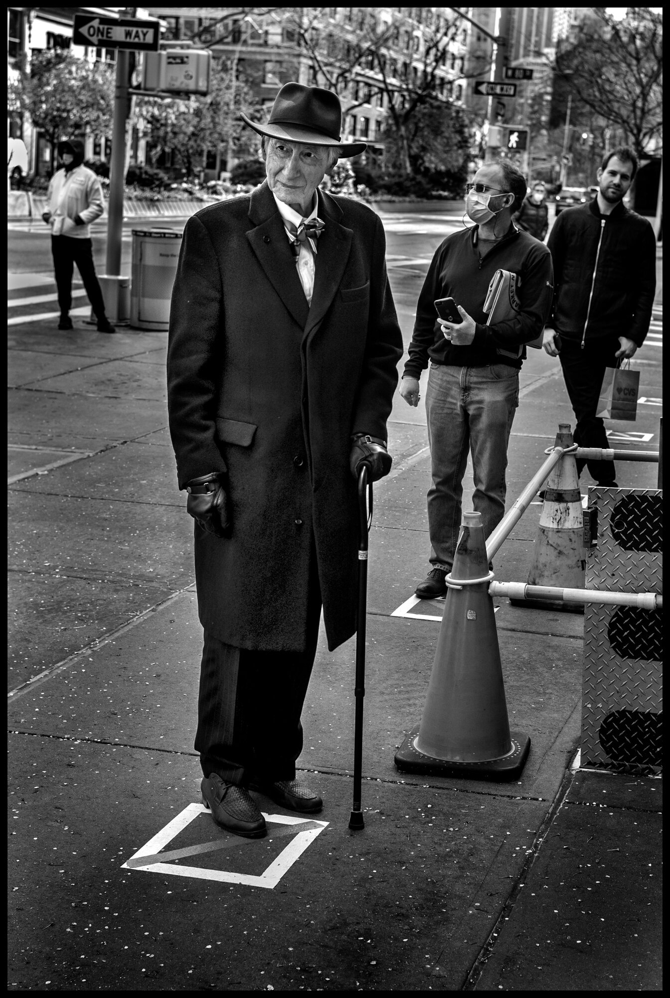  As I exited Zabar's yesterday afternoon. the store that has essentially kept me alive with food these past three weeks, I saw this gentleman standing in line waiting to enter the store. I had my camera on my shoulder as I always do, and upon seeing 