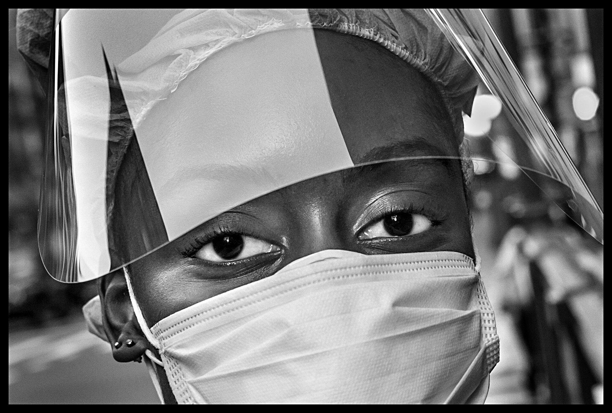  Shannone, 26, works with Covid-19 patients at Lenox Hill Hospital.   May 2, 2020. © Peter Turnley.   ID# 31-001 