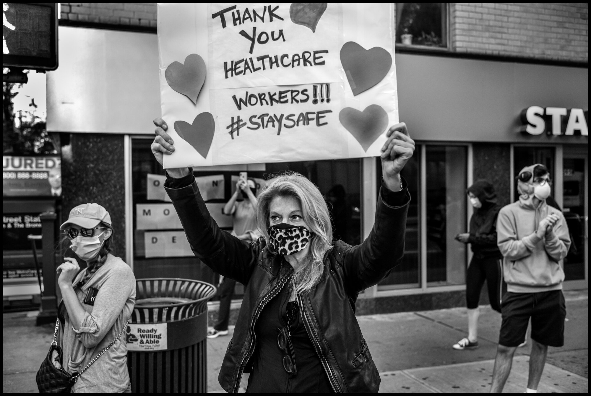  Residents of New York’s Upper East Side, thank the healthcare workers of Lenox Hill Hospital at 7pm each night.   May 2, 2020. © Peter Turnley.   ID# 36-002 