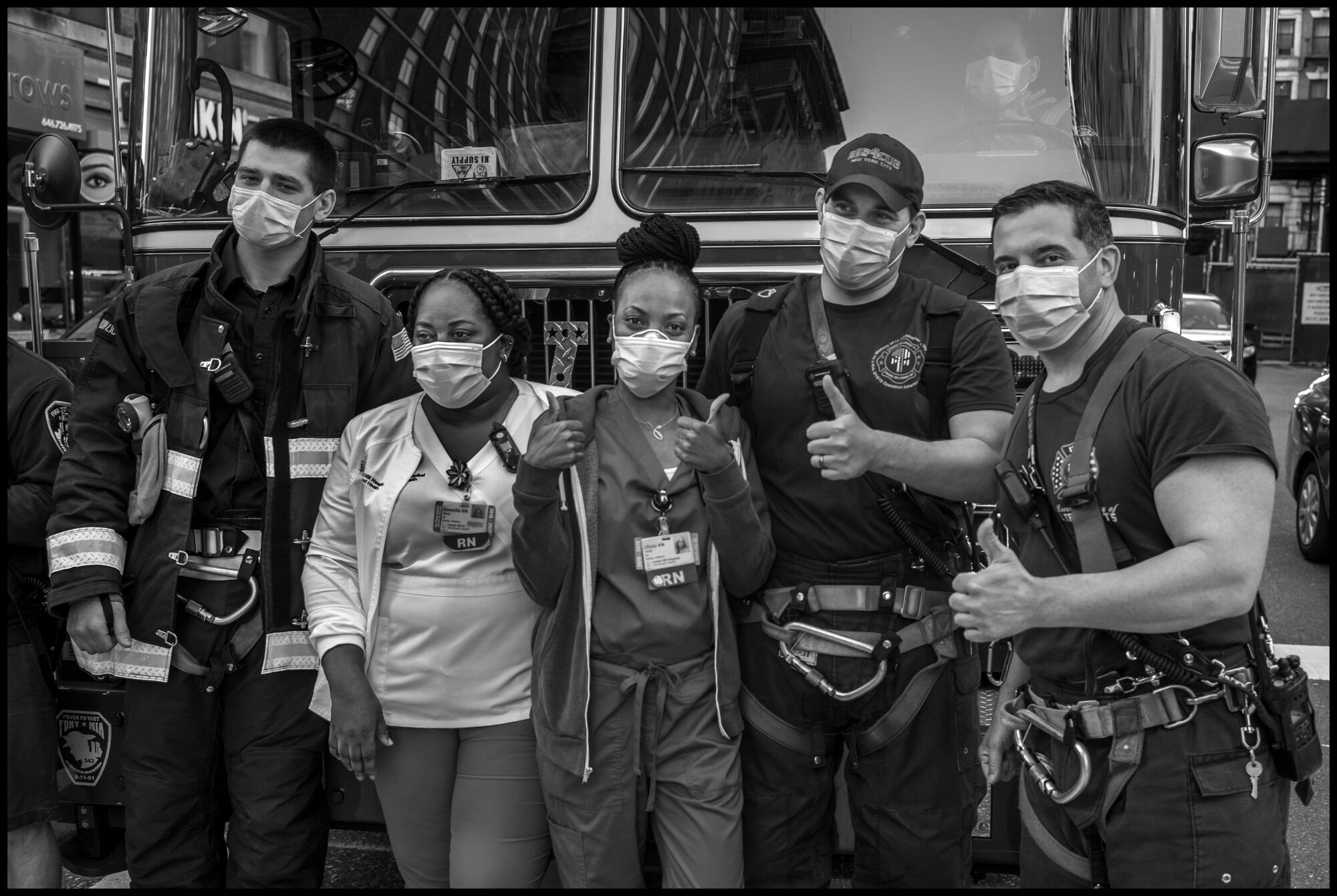  Nurses who work with Covid-19 patients at Lenox Hill Hospital on New York’s Upper East Side, with firemen who have come to share in the applause and gratitude at 7pm each night offered by the New York public for all of the healthcare and essential w