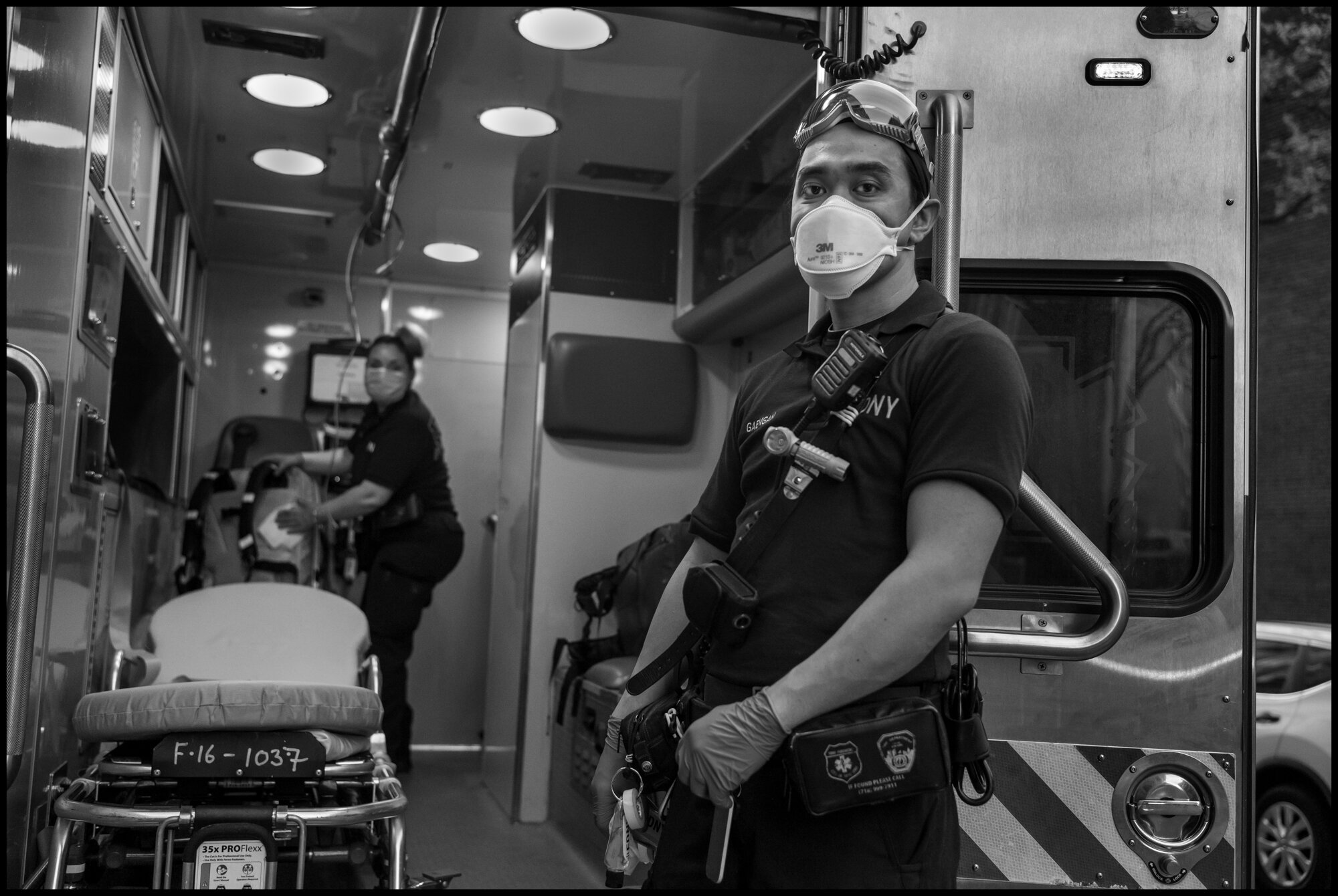  Jay, 38, and Christina, 36, two EMT’s, outside of Lenox Hill Hospital.  May 3, 2020. © Peter Turnley.   ID# 36-025 