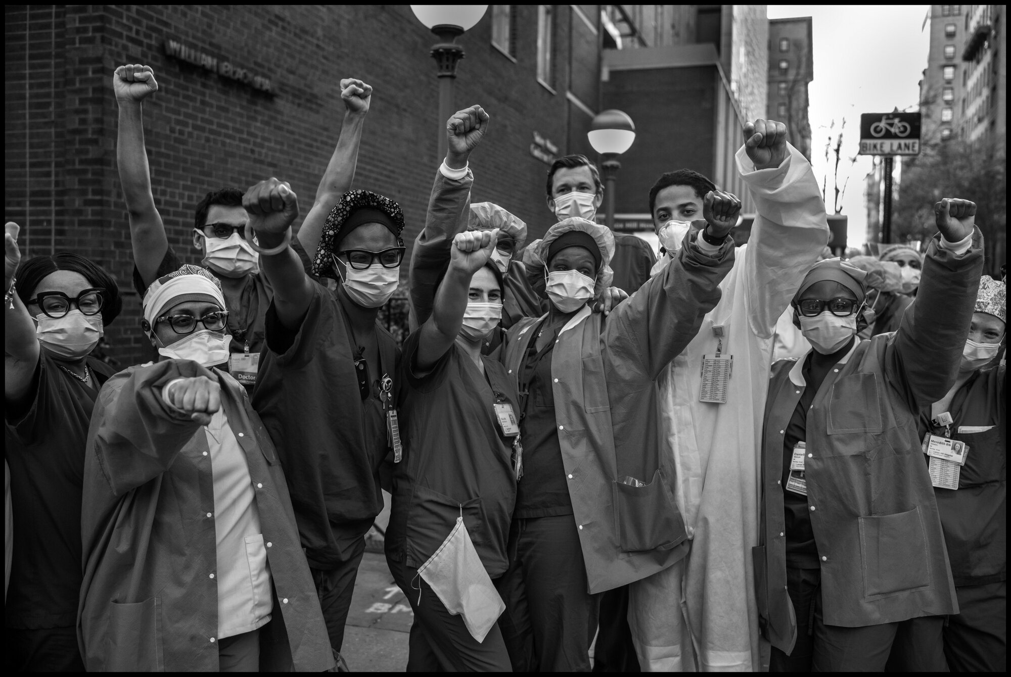  A group of ICU nurses from Lenox Hill Hospital.   May 3, 2020. © Peter Turnley.   ID# 36-027 