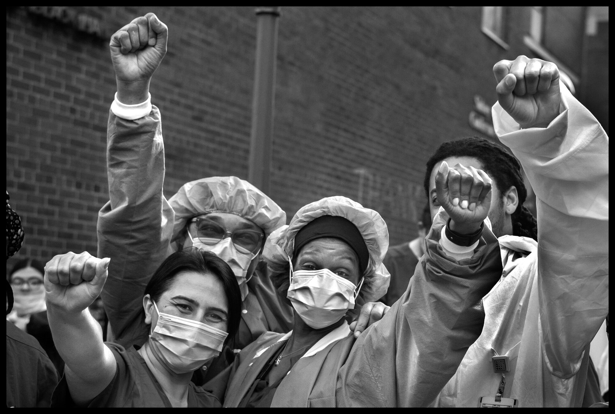  A group of ICU nurses from Lenox Hill Hospital.   May 3, 2020. © Peter Turnley.   ID# 37-001 