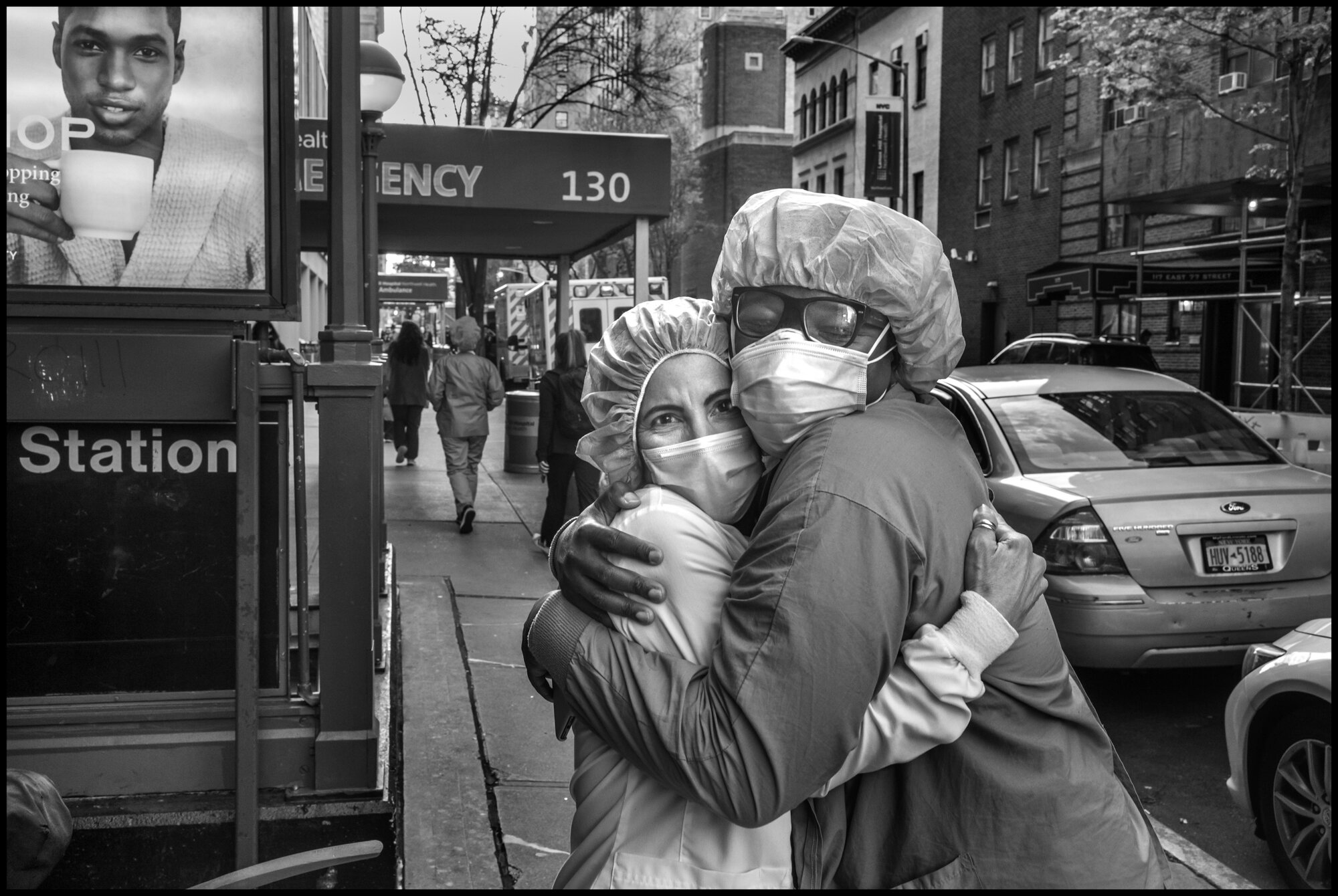  Simi, right, a traveling nurse, from Los Angeles, and has also volunteered to come help Covid-19 patients in NY for many weeks; and Erika, a traveling nurse, working with Covid-19 patients at Lenox Hill Hospital in New York City, hug right after 7pm