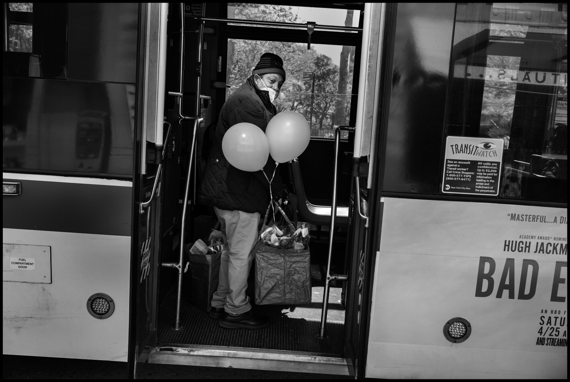  Sid is a flower delivery man, and is seen here delivering flowers for Mother’s Day, 2020.   May 10, 2020. © Peter Turnley.   ID# 42-006 