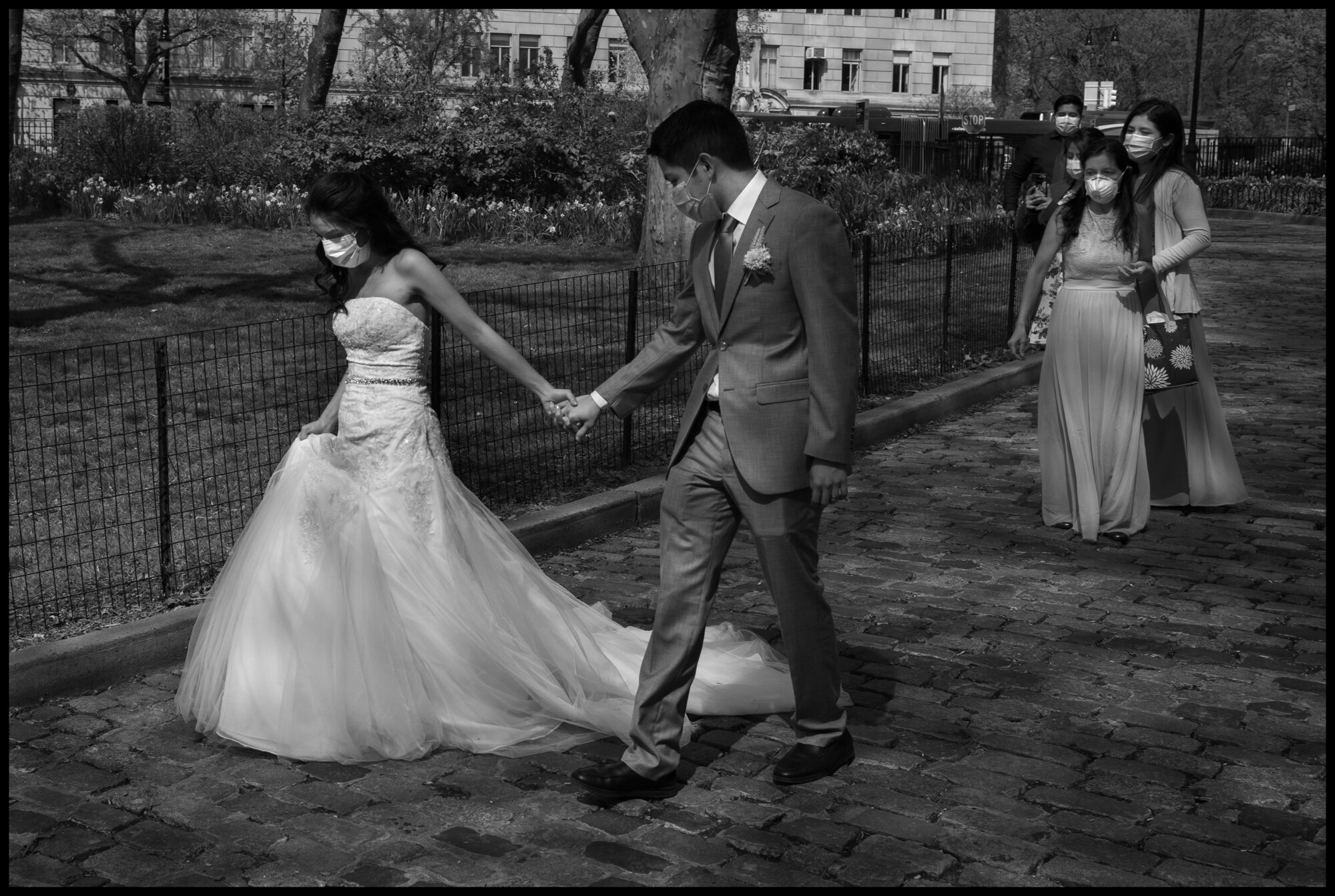  "It is not the wedding we wanted-but it is the one we needed". The wedding of Daniel and Emily. Near Central Park, New York.   April 25, 2020. © Peter Turnley  ID# 30-006 