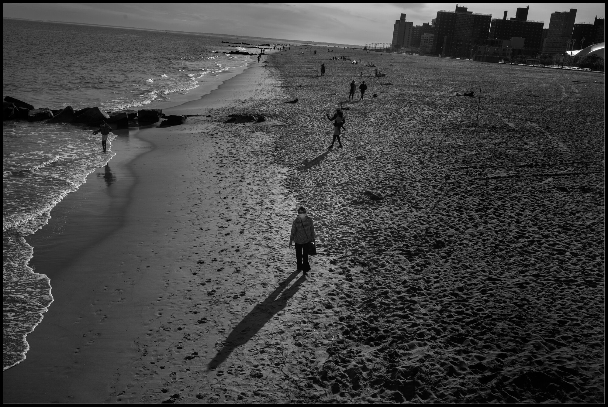  A day when the masks came off at Coney Island.  May 16, 2020. © Peter Turnley.  ID# 49-015 