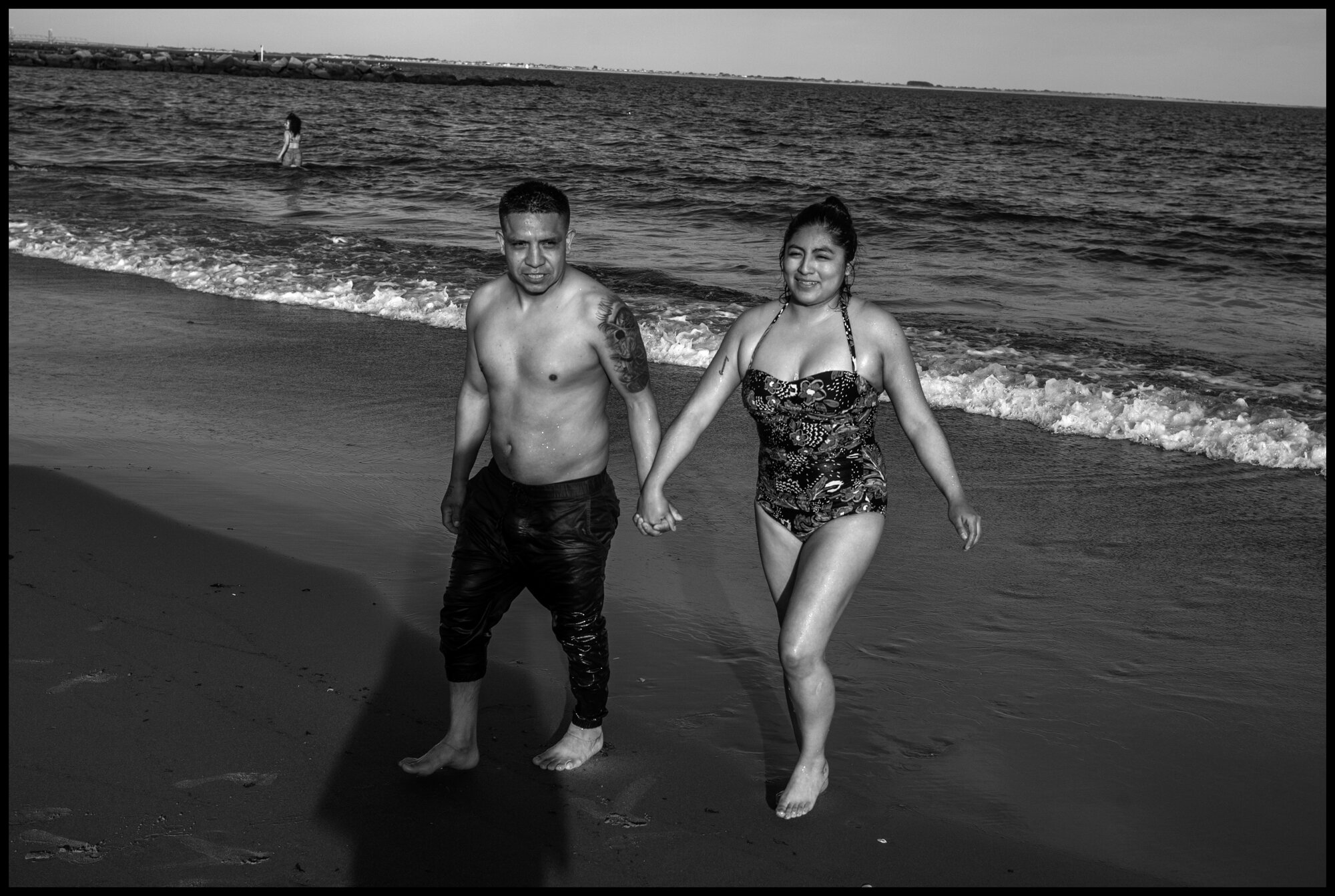  Luis and Alexandra, both from Ecuador.Coney Island, New York.  May 16, 2020. © Peter Turnley.  ID# 49-017 