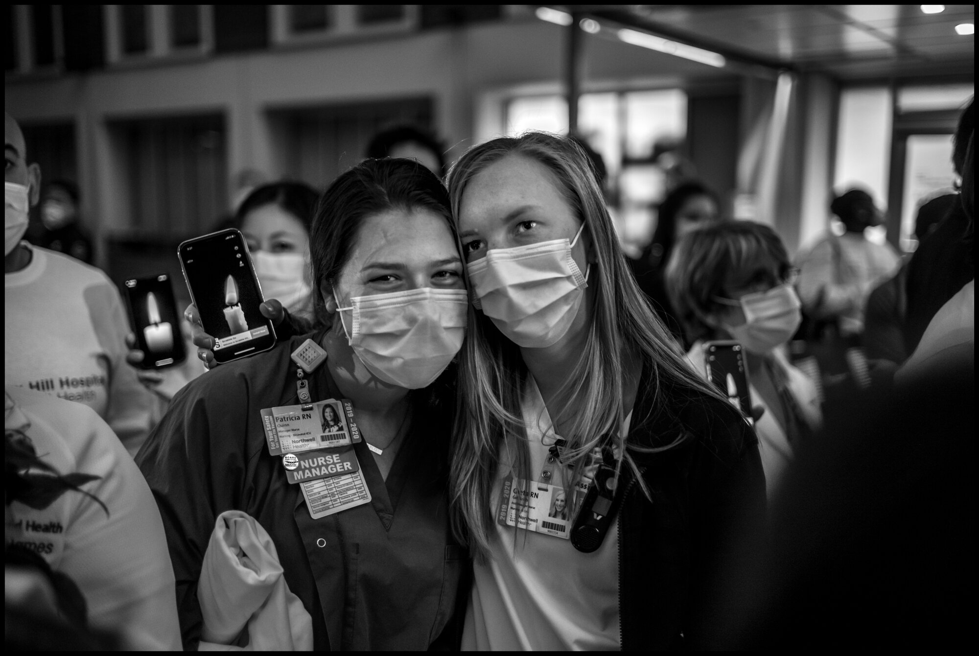  Frontline workers from Lenox Hill Hospital, New York, hold vigil to honor all victims of COVID-19.  May 20, 2020. © Peter Turnley.   ID# 51-012 