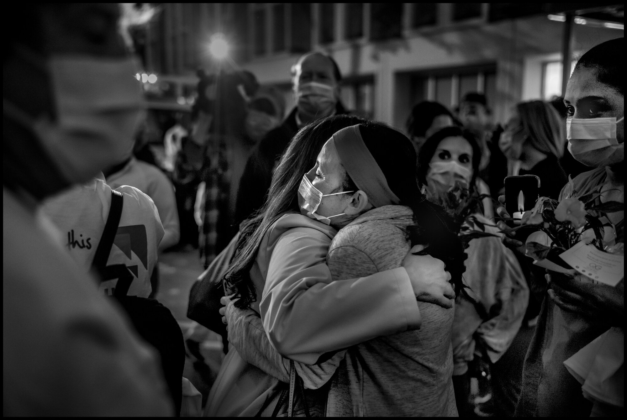  Frontline workers from Lenox Hill Hospital, New York, hold vigil to honor all victims of COVID-19.  May 20, 2020. © Peter Turnley.   ID# 51-006 