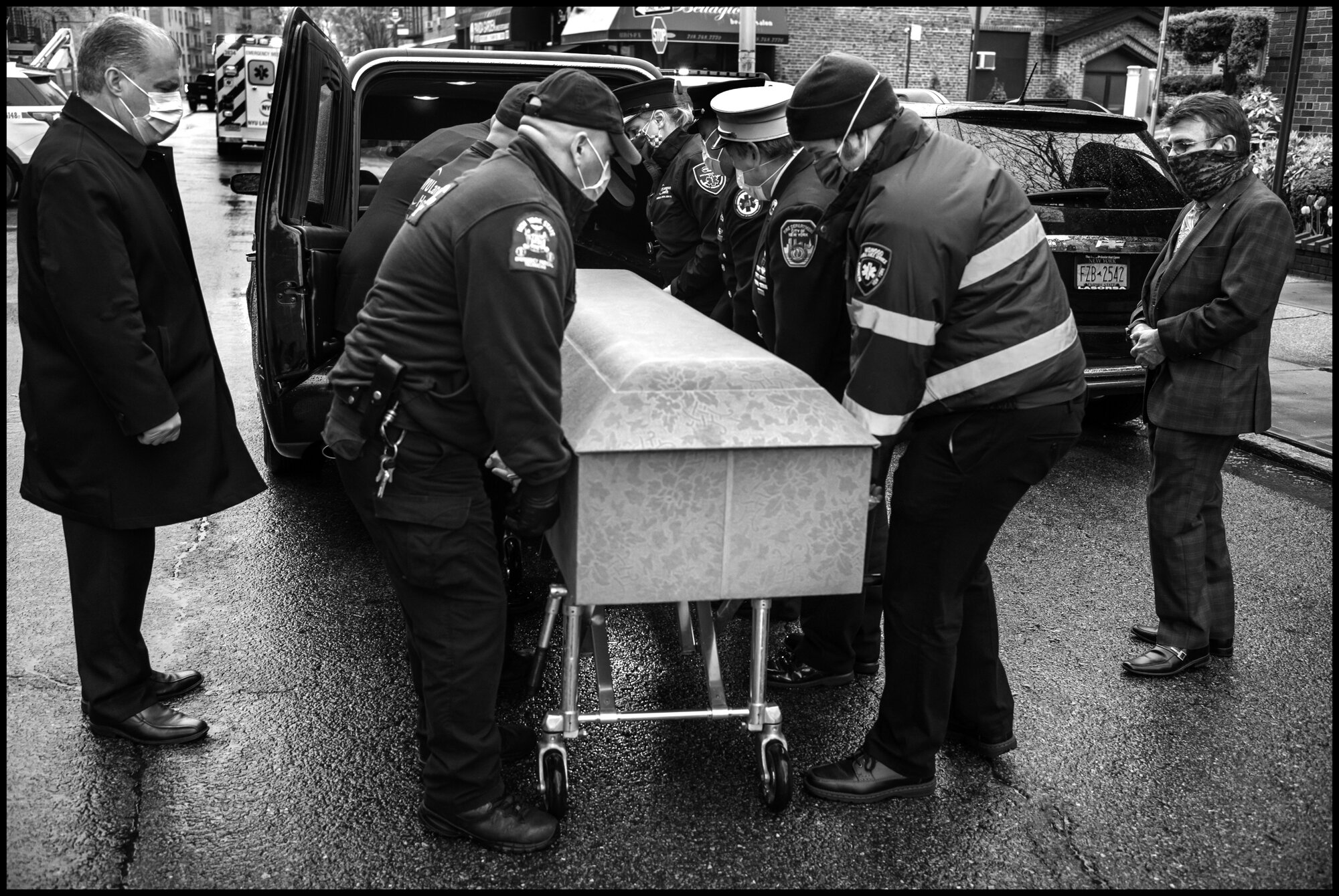  A funeral ceremony for Anthony “Tony” Thomas—a legendary Paramedic in the New York City area, who died of Covid-19 related causes. Bay Ridge, Brooklyn, New York.  April 30, 2020. © Peter Turnley.  ID# 55-001 