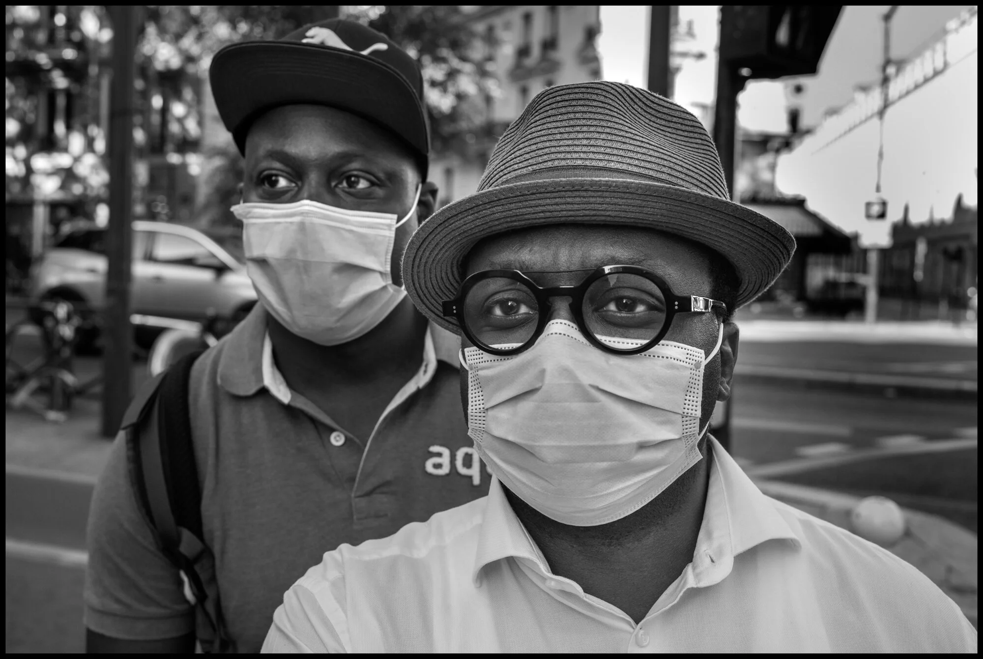  Daniel and Patrick. Gare du Nord, Paris.  May 26, 2020. © Peter Turnley.  ID# P04-028 