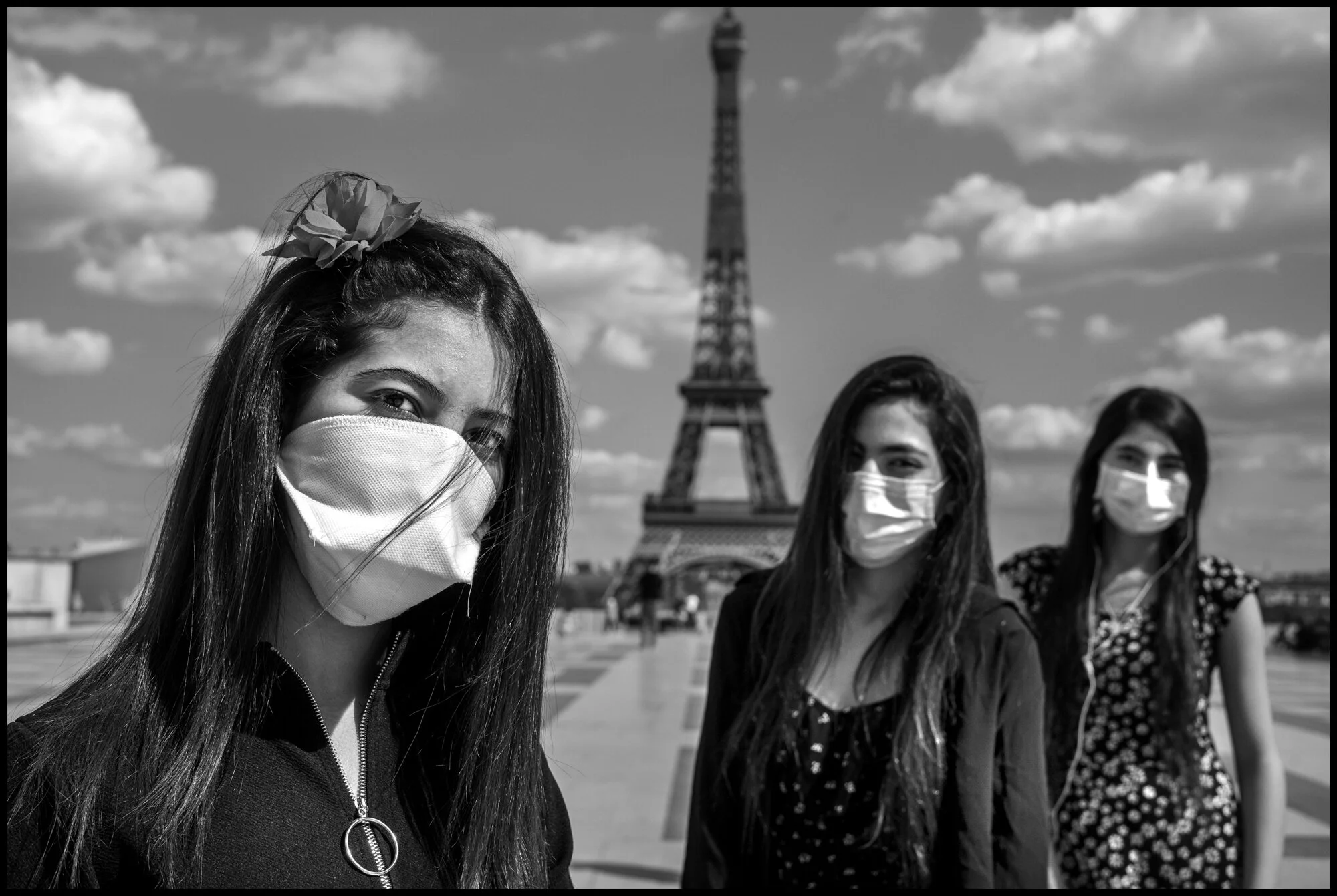  Nourhene, Hanane, and a friend, Place de Trocadero. Paris.  May 25, 2020. © Peter Turnley.  ID# P02-003 