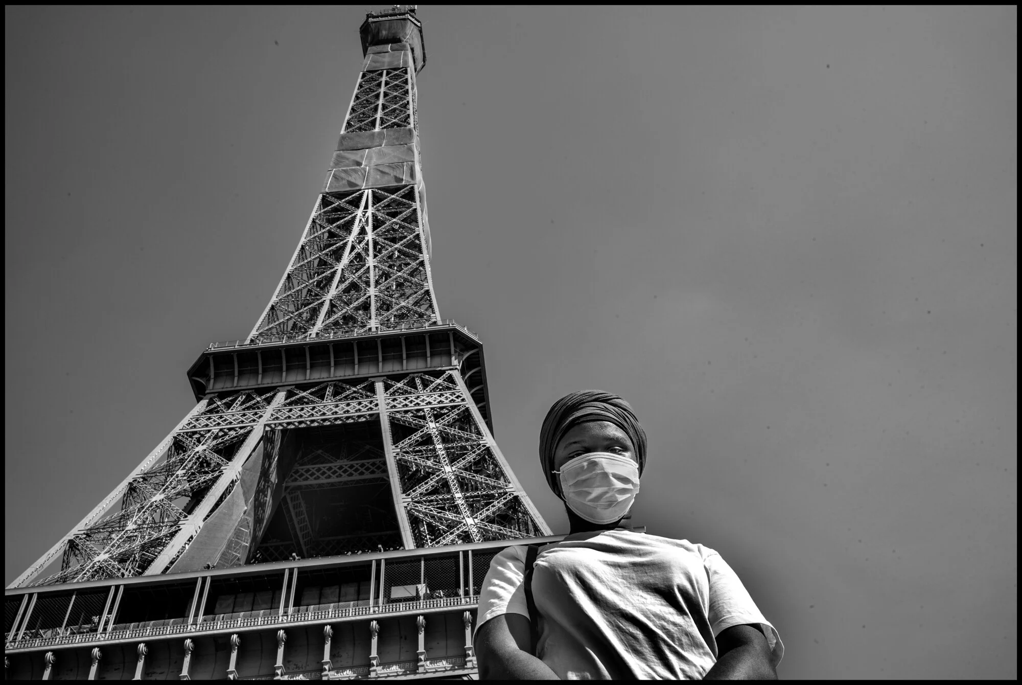  Laetitia, a student in business management. For the past two months, her mother has had to stay at a distance from her family while at home because she works in a nursing home.   May 27, 2020. © Peter Turnley.  ID# P06-005 