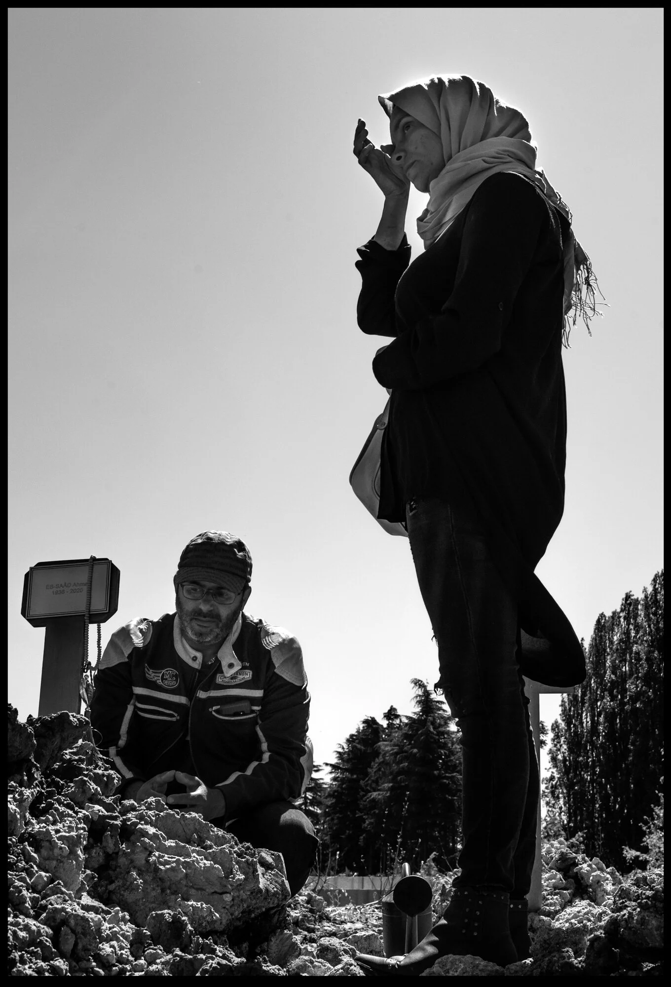  Nadia and Mimoun, grieve the death from covid-19 of their father and father in law, Ahmed Es-Saad—1936-2020. Denis, France.   May 29, 2020. © Peter Turnley.  ID# P09-001 