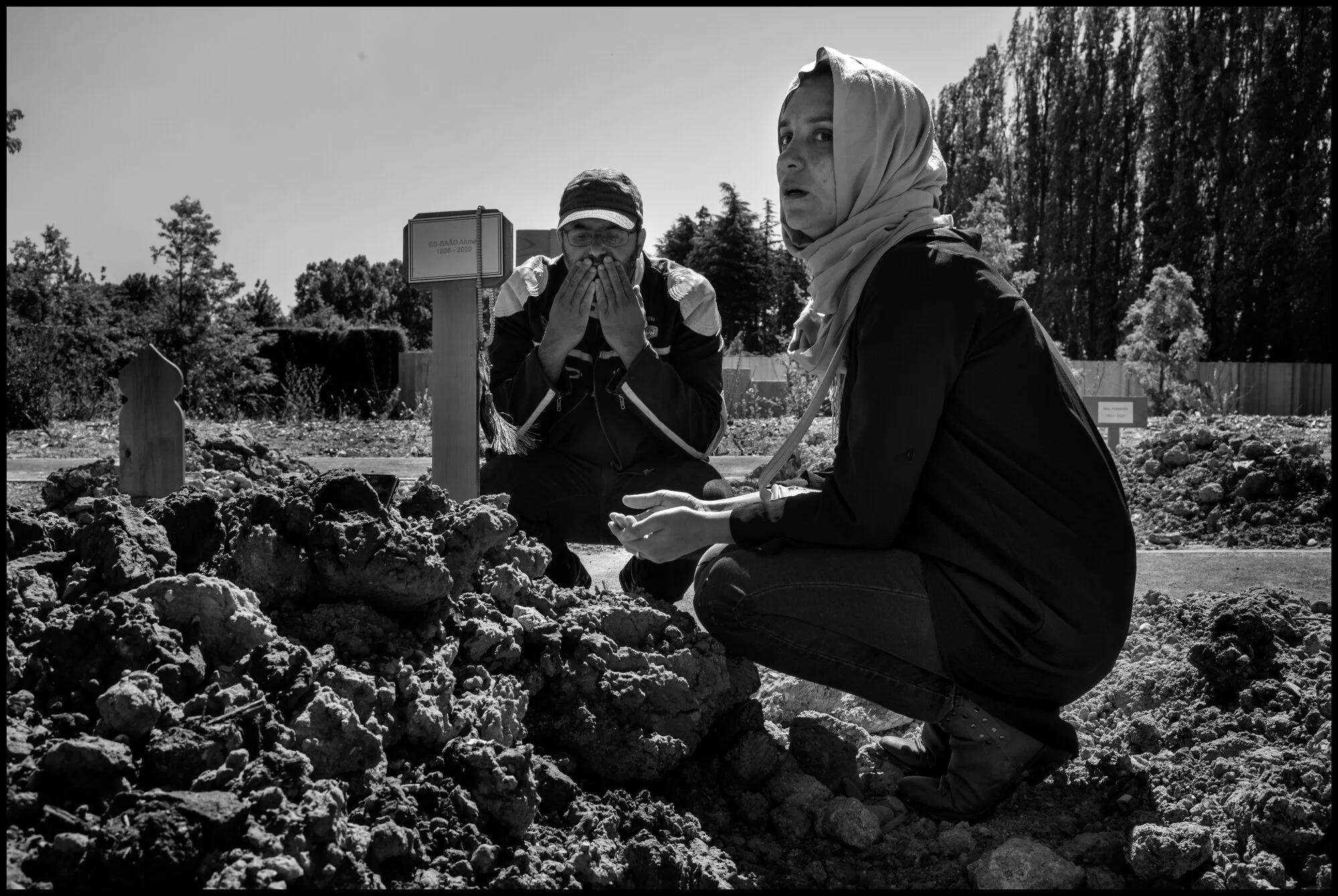  Mimoun, Kader, and Nadia. St. Denis, France.   May 29, 2020. © Peter Turnley.  ID# P08-008 