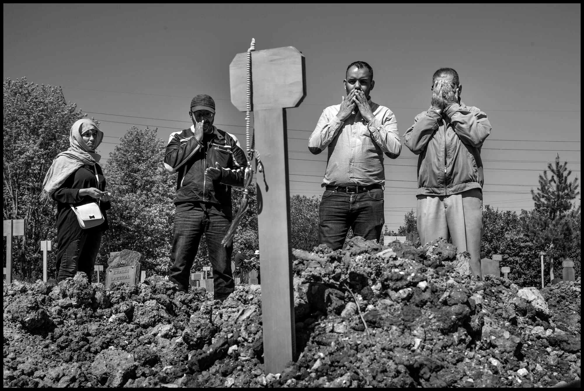  Mimoun, Kader, and Nadia. St. Denis, France.   May 29, 2020. © Peter Turnley.  ID# P08-008 