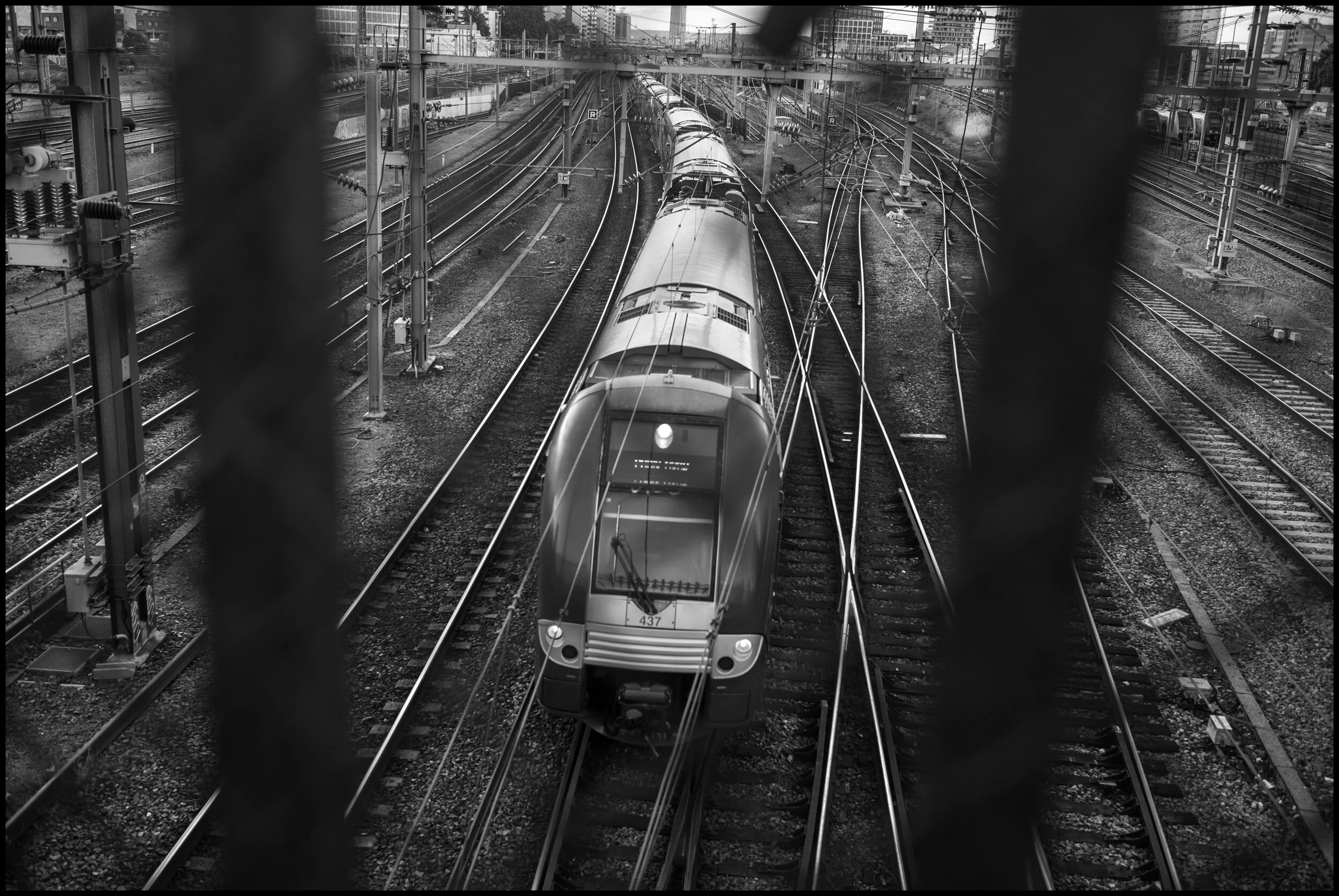  Overpass of train lines leading to Paris's Gare du Nord train station, Marcadet-Poissionniers, Paris.  June 19, 2020. © Peter Turnley.  ID# P35-010 