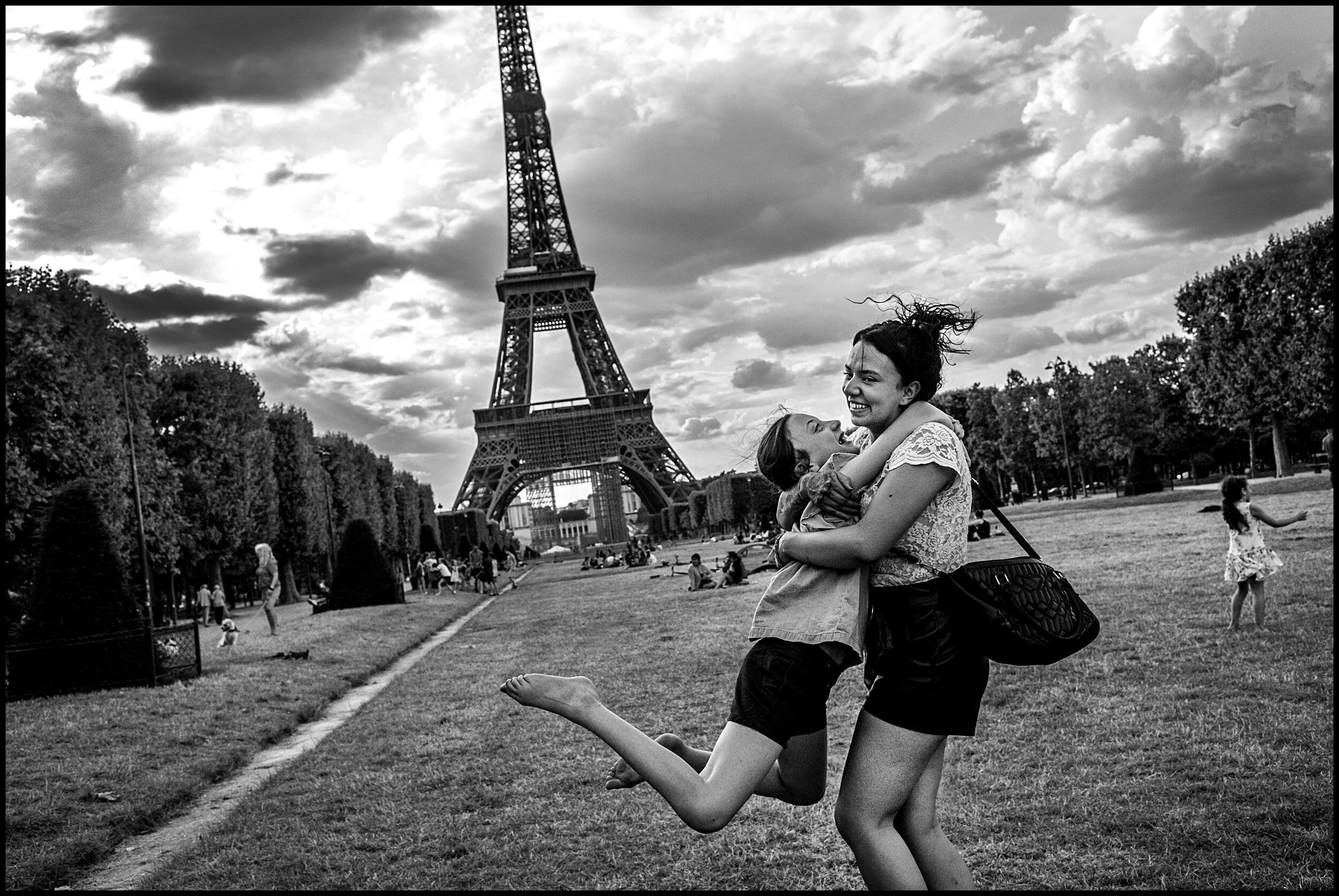  Natalia and Melania, Eiffel Tour.   June 26, 2020. © Peter Turnley.   ID# P45-002 