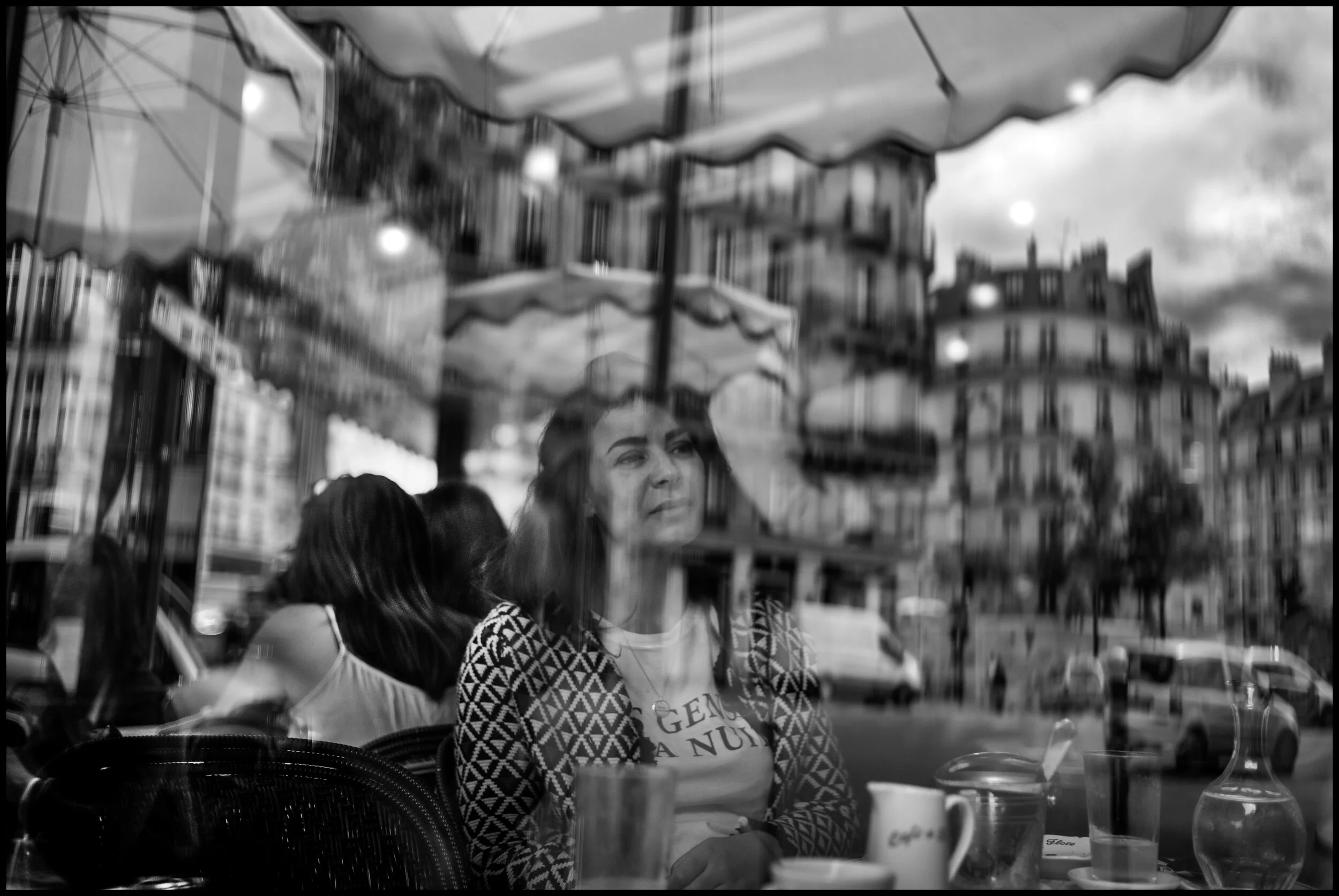  Zoé, Café de Flore, Paris. July 4, 2020. © Peter Turnley.  ID# P53-008 