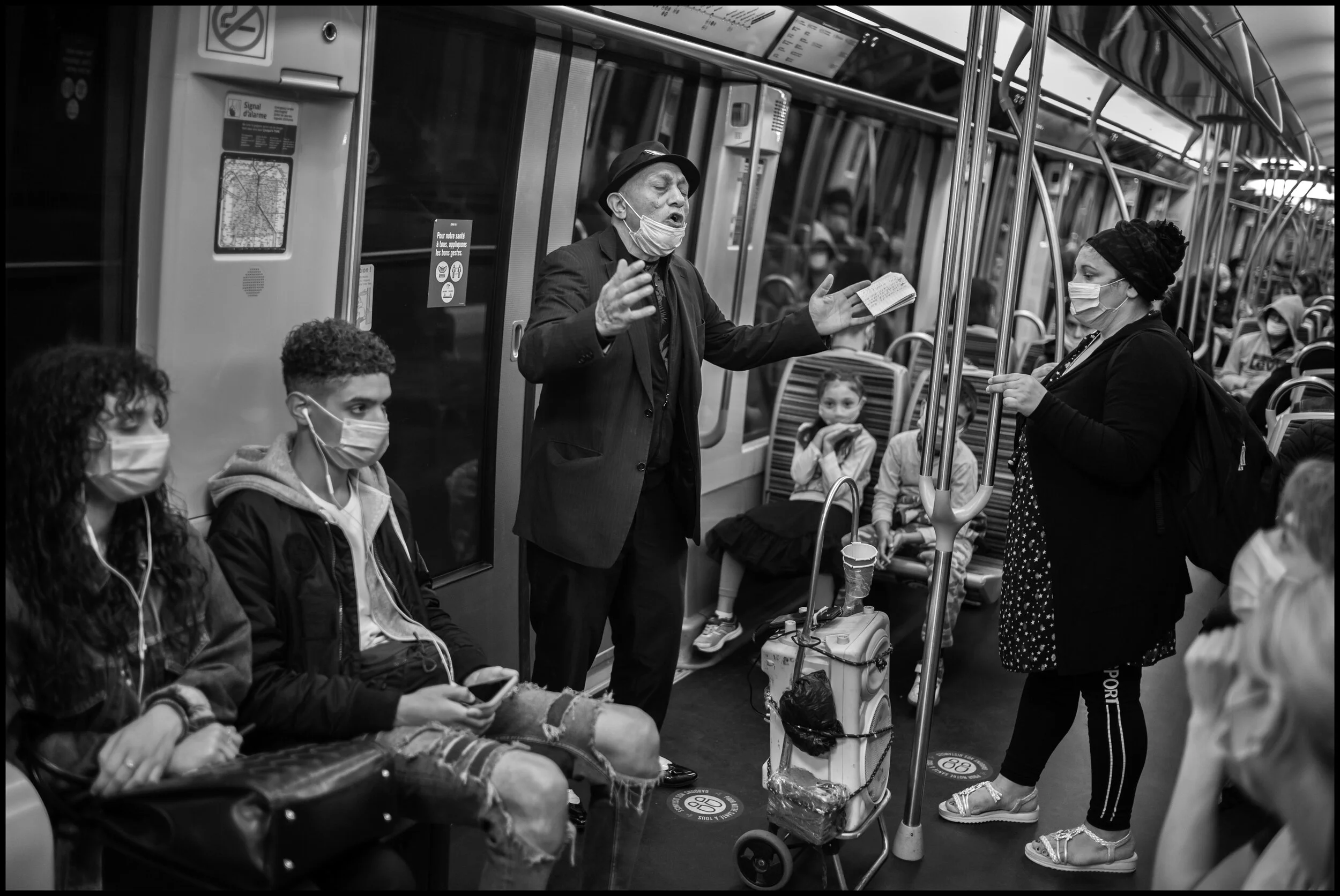  Ditl, originally from Moldavia, sings in the metro with his family, to make money.  July 5, 2020. © Peter Turnley.  ID# P53-010 