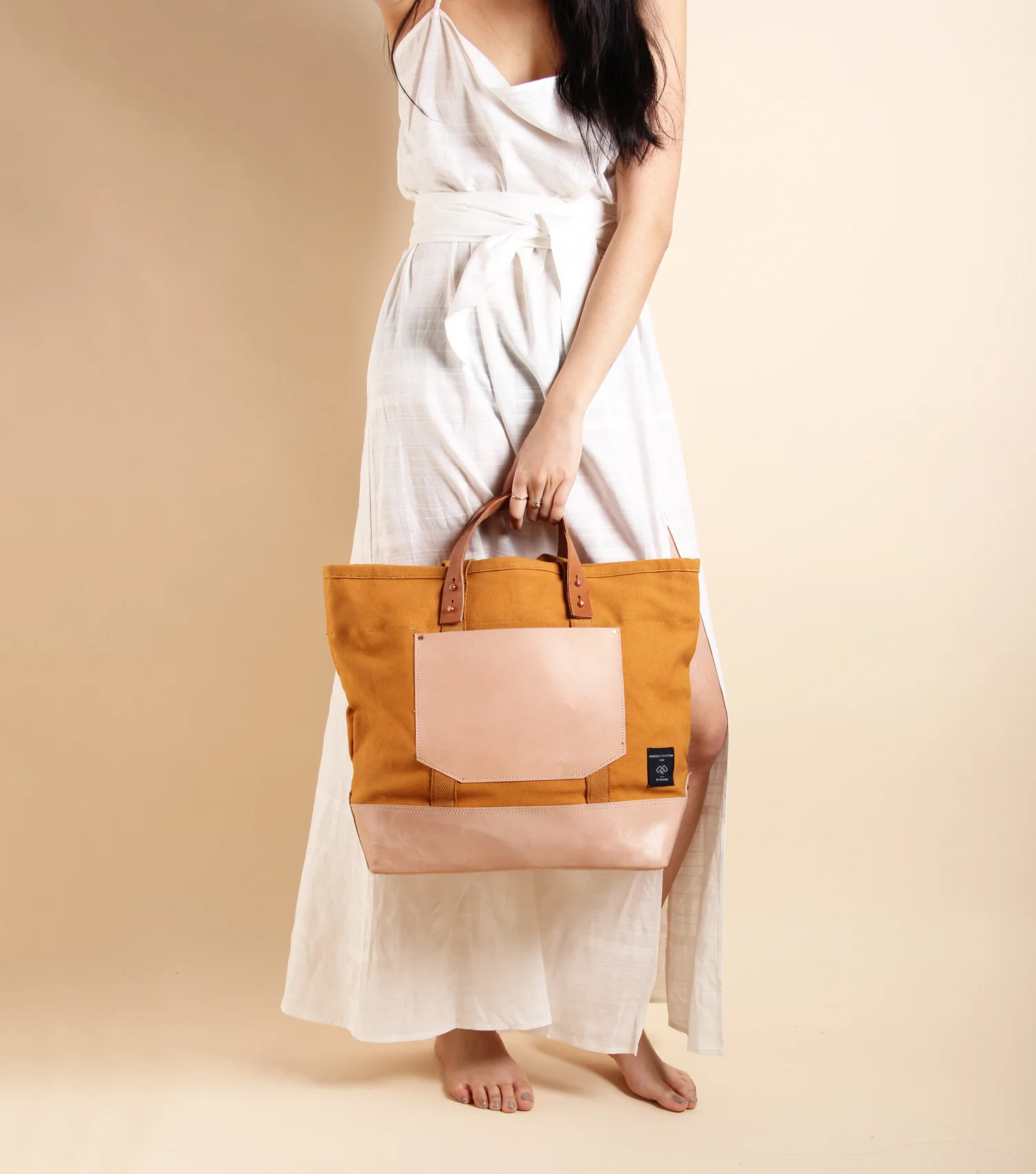 Model_Model_EW Bucket Tote_Mustard Seed_.jpg