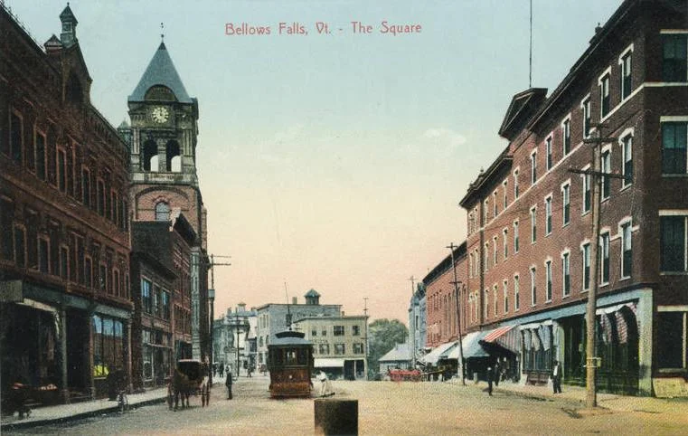 One of the earliest postercard photographs of the Village of Bellows Falls, On the Square, as it looked in the late 1800s. Looking at the north end of The Square, the four-story hotel, on the right, was destroyed in a 1932 fire and replaced by the current three-story Georgian Revival classic.