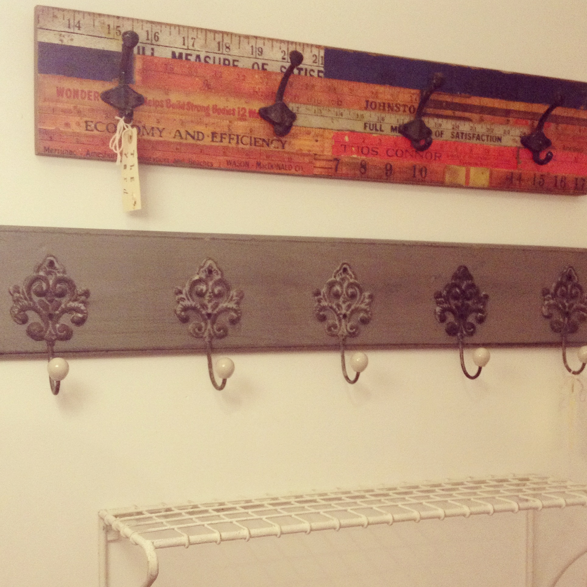 Grey rack with filigree hooks