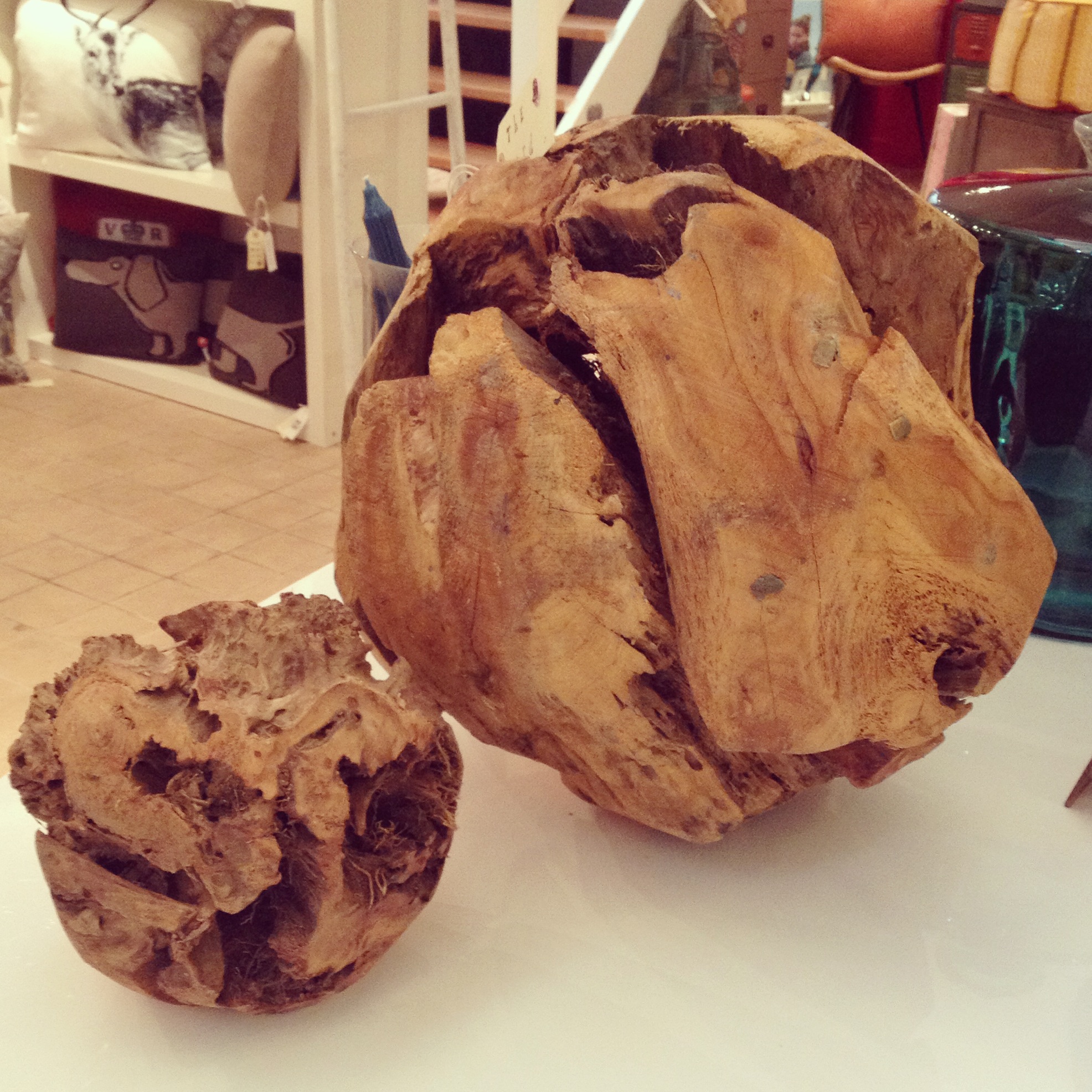 Large and small decorative balls made of tree roots