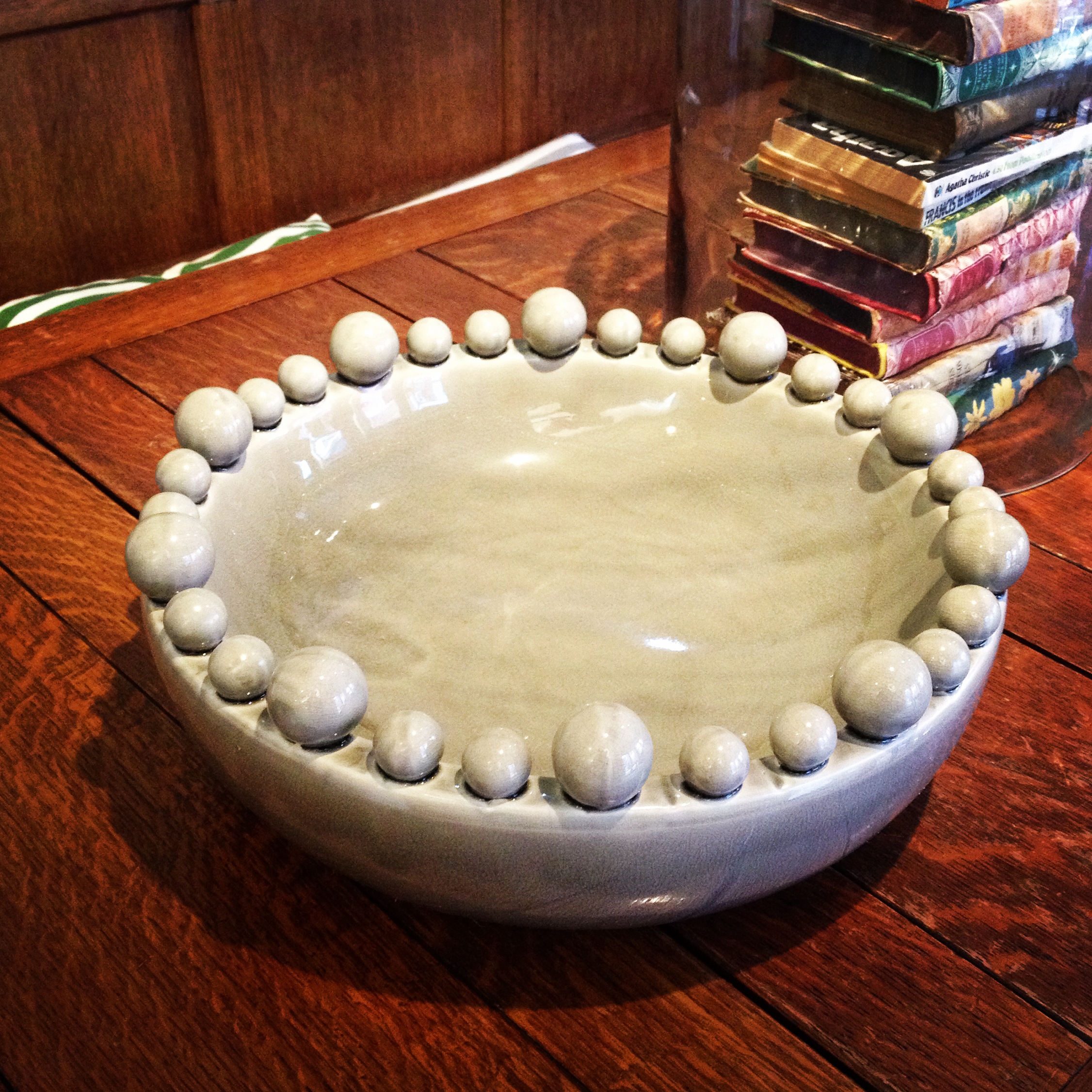 Large grey bowl decorated with balls