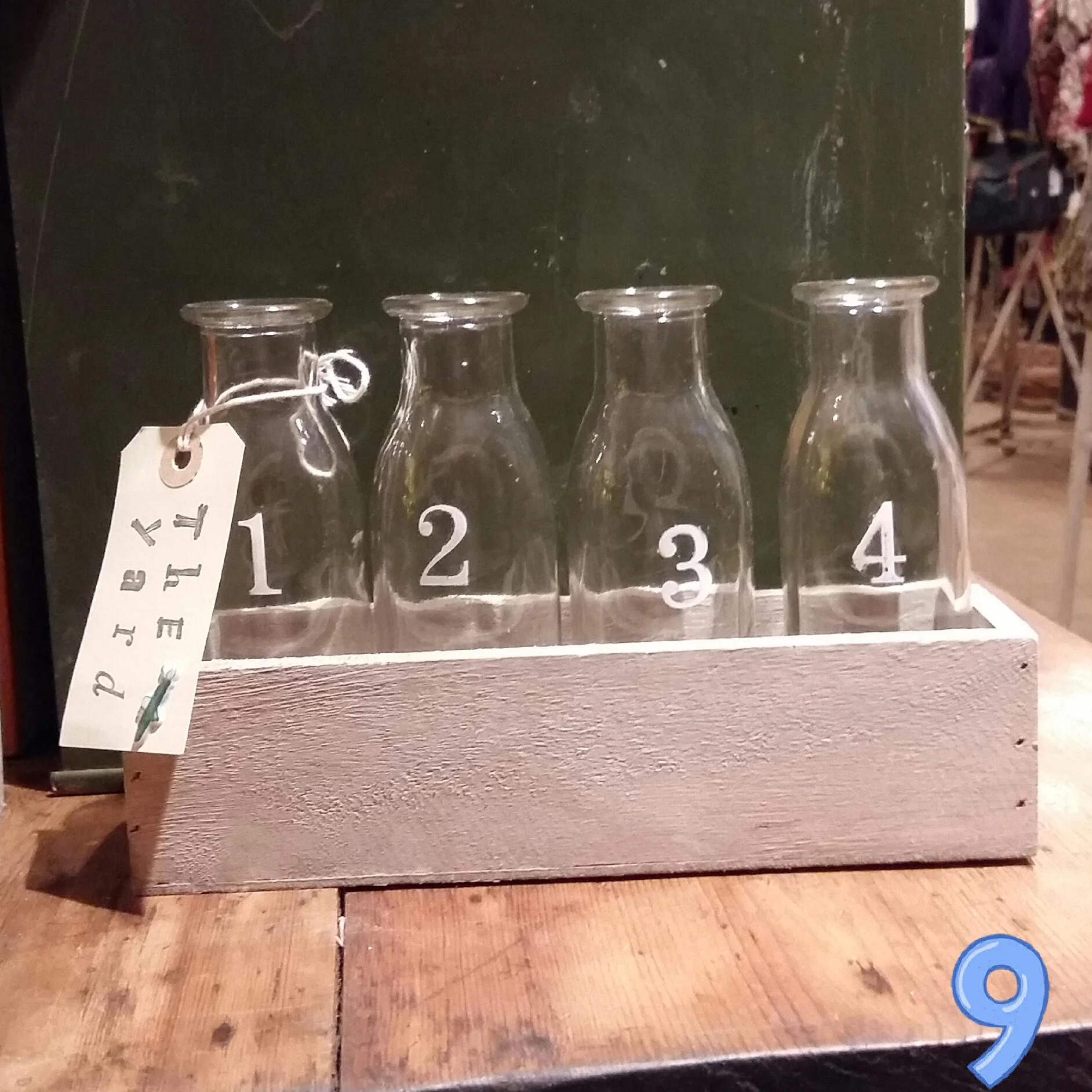 Numbered bottles in tray £7.50