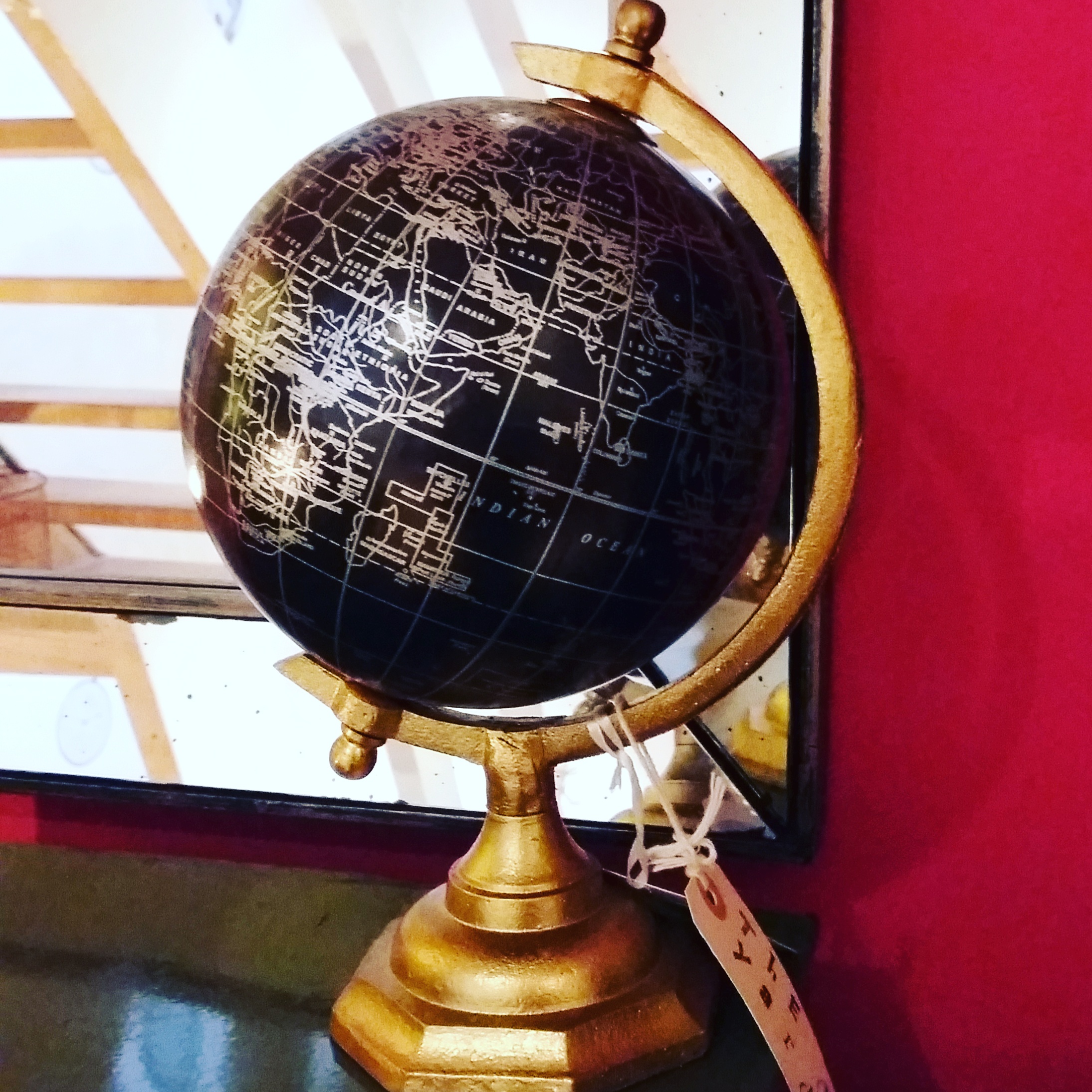 Small black and gold globe