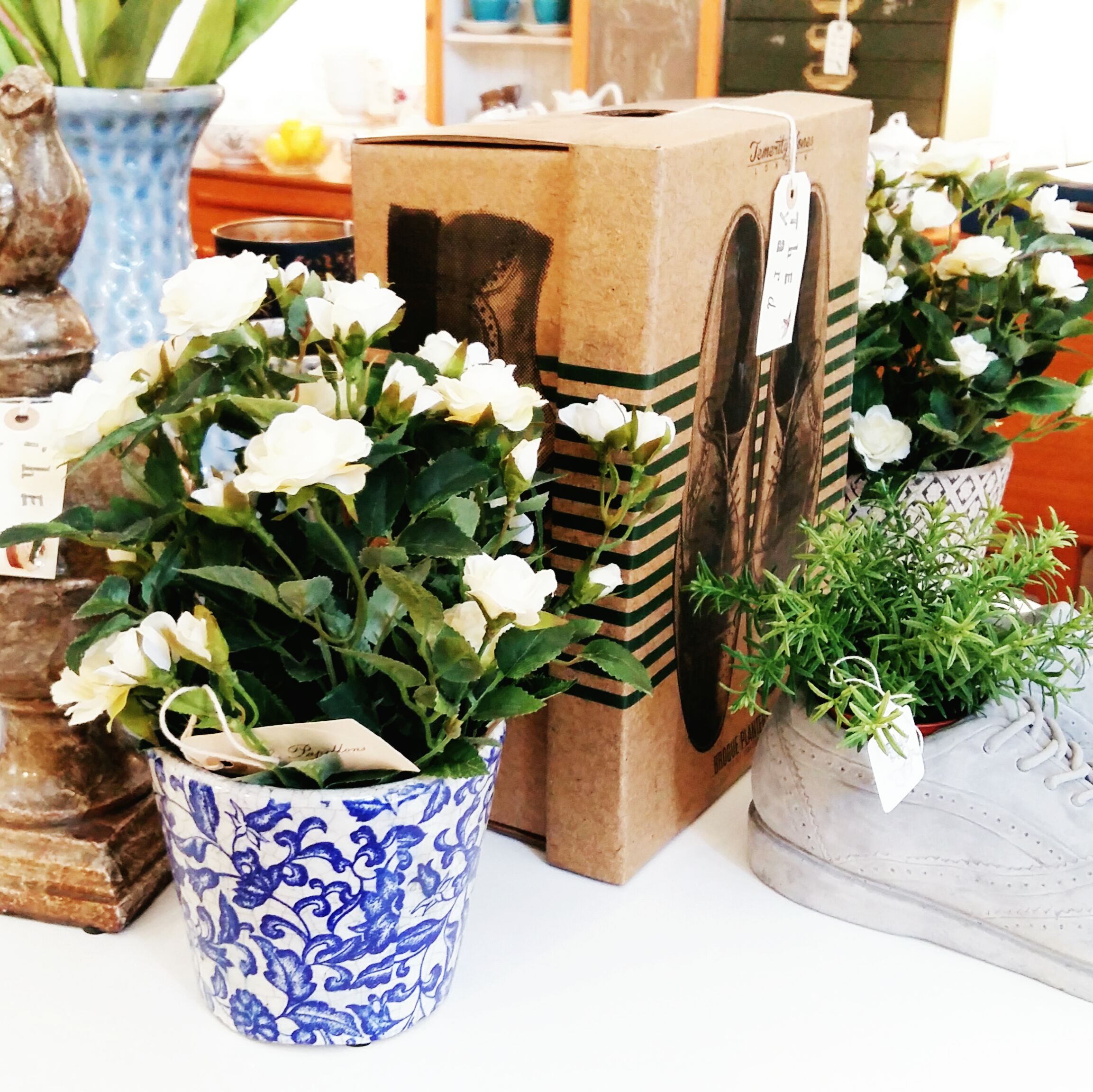 Faux roses and rosemary