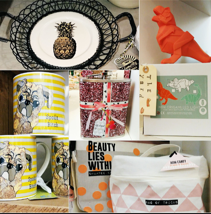 Pineapple tray, origami dinosaur led light, wash bags, dog mugs and hip flasks. 